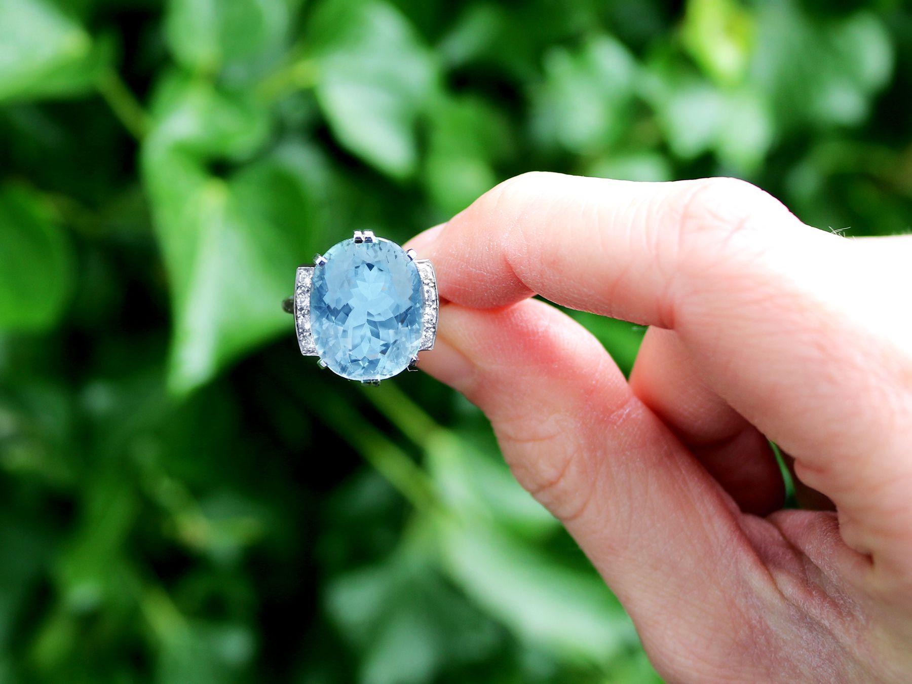 A stunning, fine and impressive vintage French 10.12 carat aquamarine and 0.20 carat diamond, platinum cocktail ring; part of our diverse gemstone jewelry and estate jewelry collections.

This stunning, fine and impressive vintage gemstone ring has