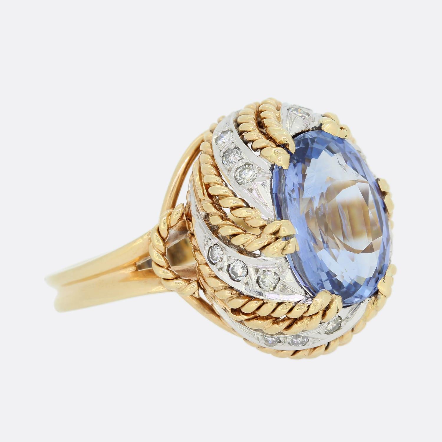 Oval Cut Vintage 10.19 Carat Sri Lankan Sapphire and Diamond Cluster Ring For Sale