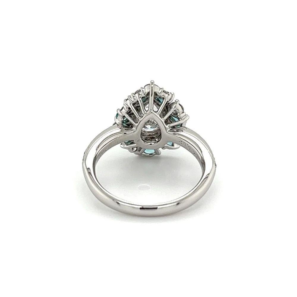 Vintage 1.02 Carat Pear Diamond IGI and Paraiba Tourmaline Platinum Ring In Excellent Condition For Sale In Montreal, QC