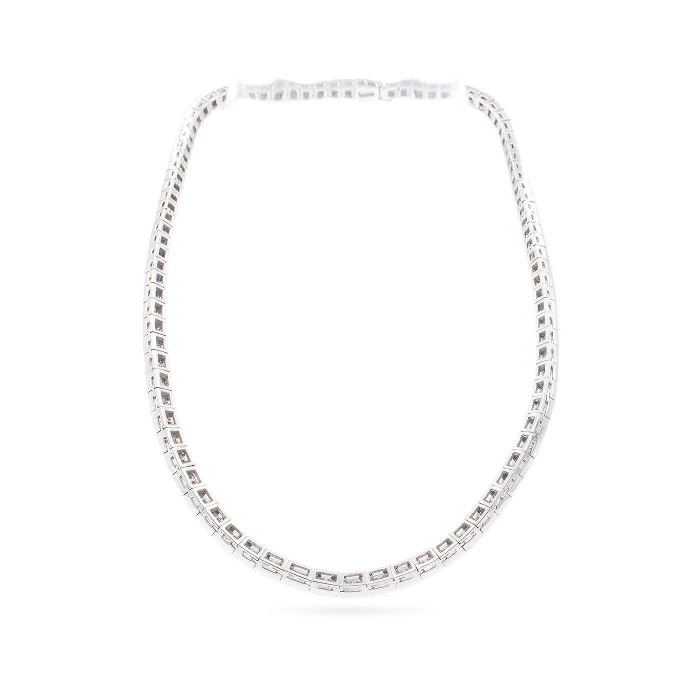 Vintage 10.38 Ctw. Baguette Cut Diamond Collar Necklace composed of platinum. With 10.38 carats of Baguette Cut diamonds, with colors ranging G-H-I and clarities ranging VS1-VS2. Diamonds are channel set in platinum links. Necklace weighs 78.9 grams