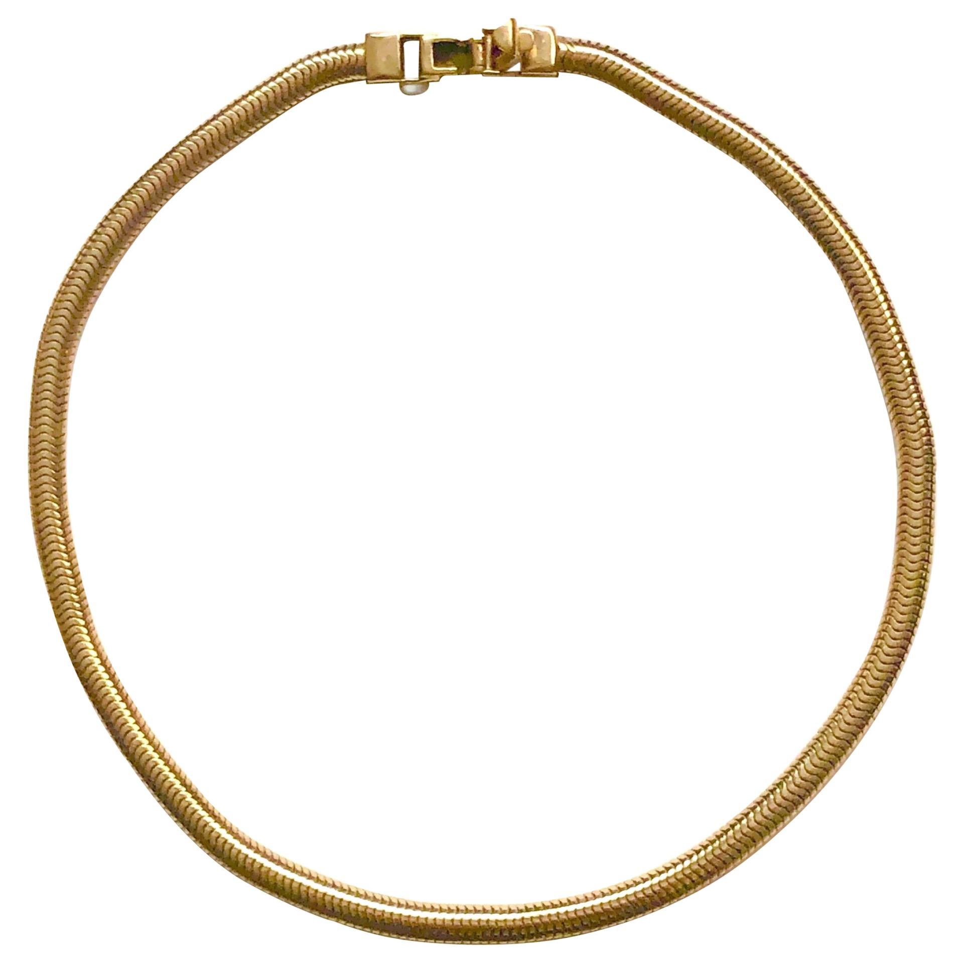 Vintage 1940s Snake Necklace 14 Karat Gold with Ruby Trim on the Clasp For Sale