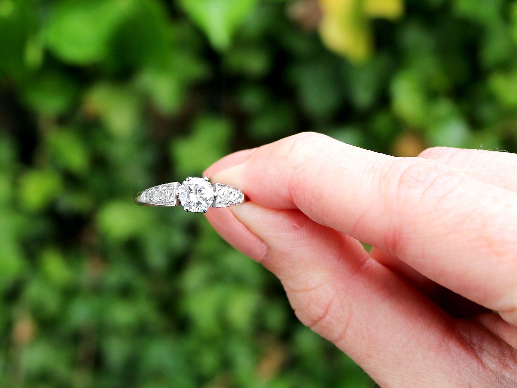A stunning, fine and impressive 1.07 carat diamond and platinum solitaire engagement ring; part of our diverse jewellery and estate jewelry collections

This fine and impressive vintage diamond ring has been crafted in platinum.

The pierced