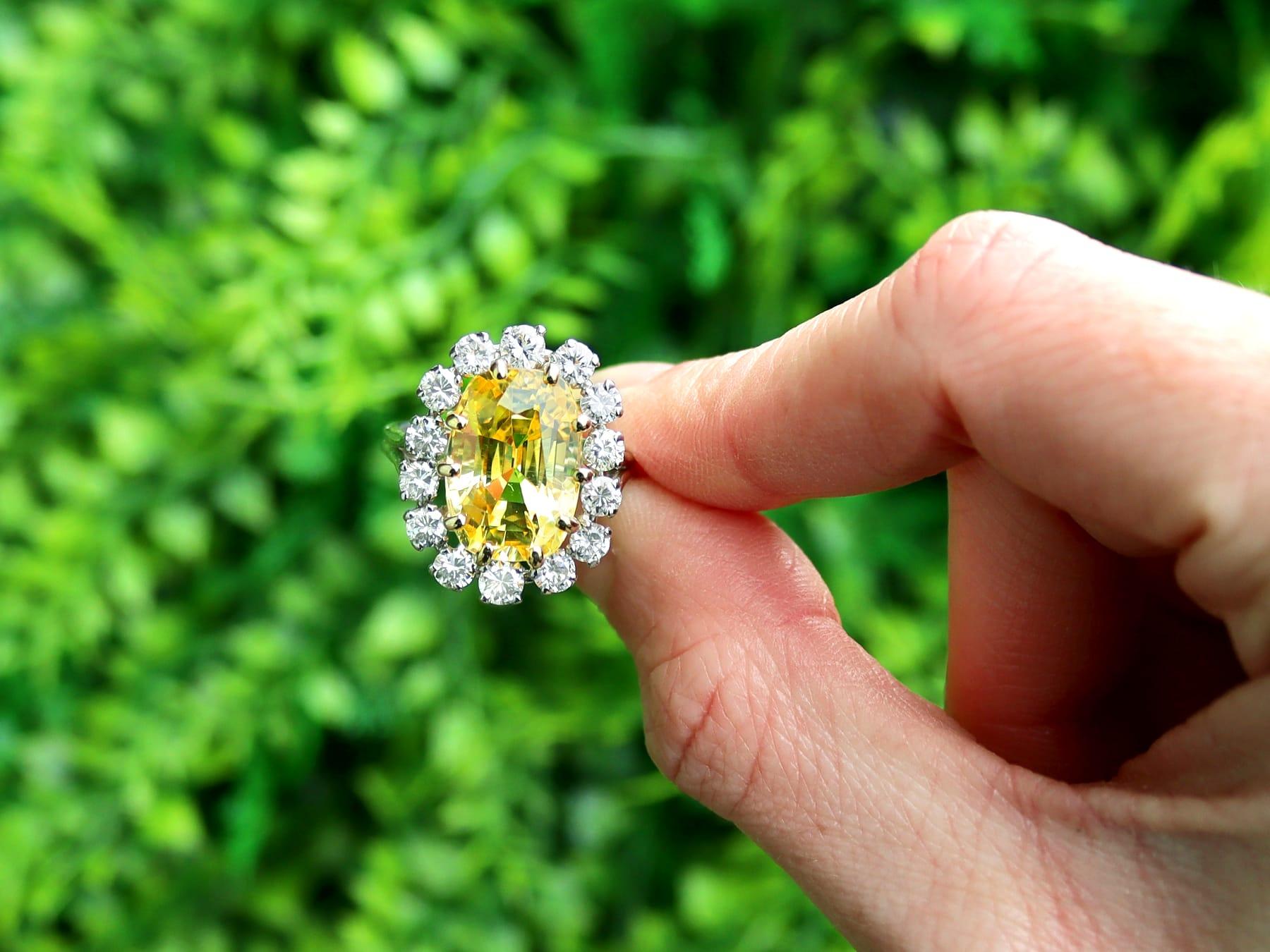A stunning, fine and impressive vintage French 10.78 Carat Ceylon yellow sapphire and 1.42 Carat diamond, platinum ring; part of our yellow sapphire jewelry collections.

This stunning, fine and impressive vintage yellow sapphire ring has been