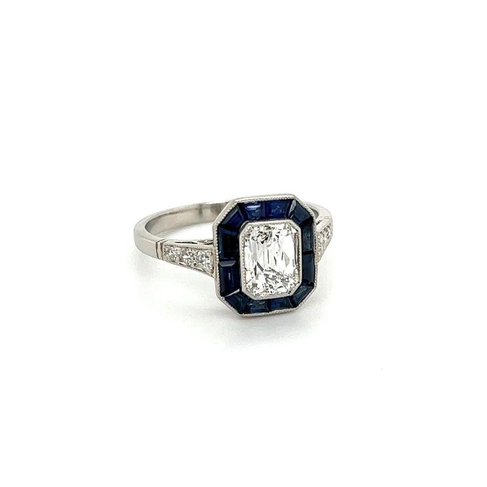 
Simply Beautiful! Finely detailed GIA Crisscut Diamond G-VS1 and Sapphire Vintage Platinum Cocktail Ring. Centering a securely nestled Hand set 1.08 Carat Criss-Cut Diamond, GIA report #6214461745. Surrounded by 12 Sapphires, weighing approx.