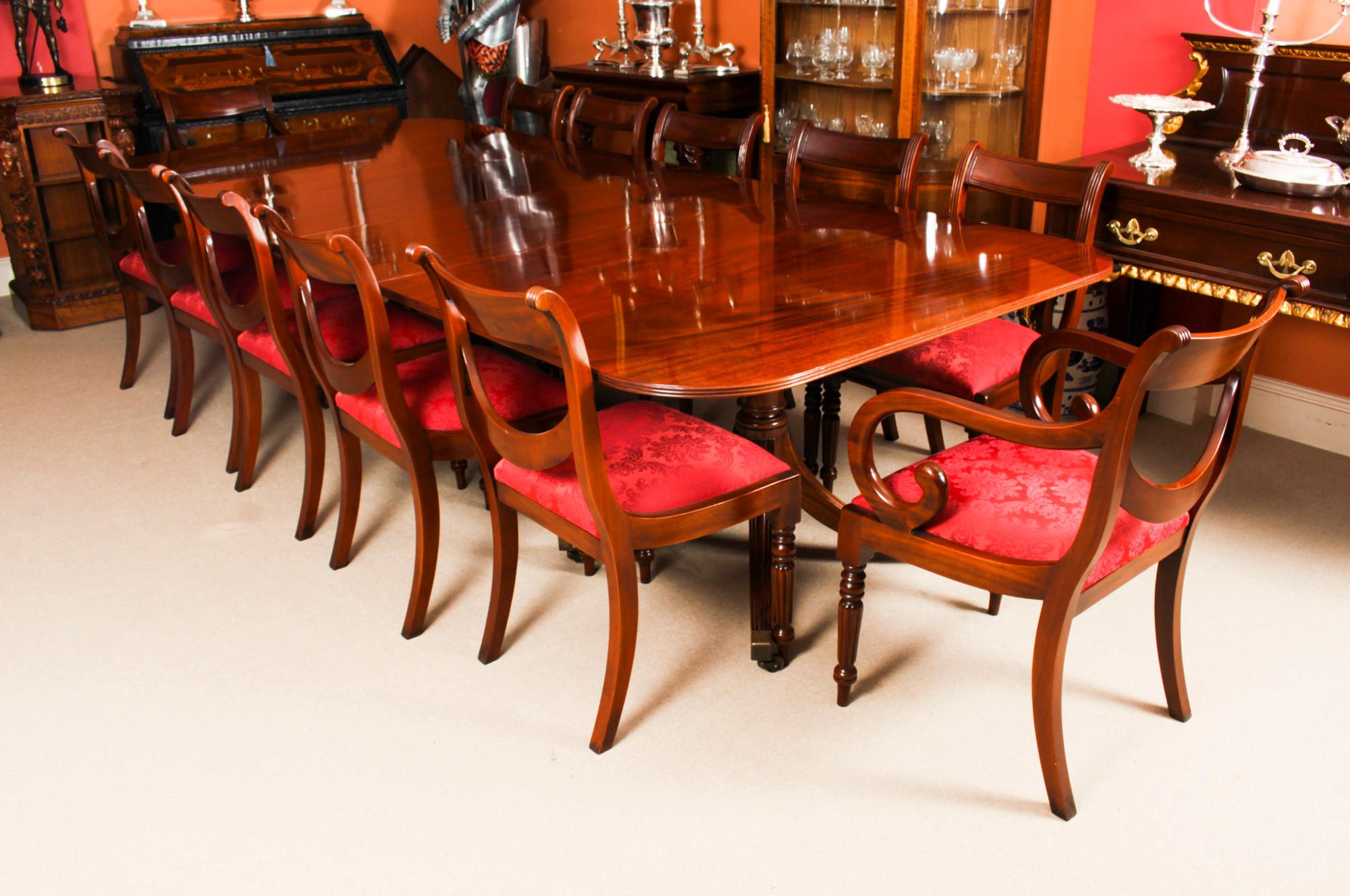 This is fabulous Vintage Regency Revival dining table by the master cabinet maker William Tillman, Circa 1980 in date.

The table is made of stunning solid flame mahogany and is raised on twin 