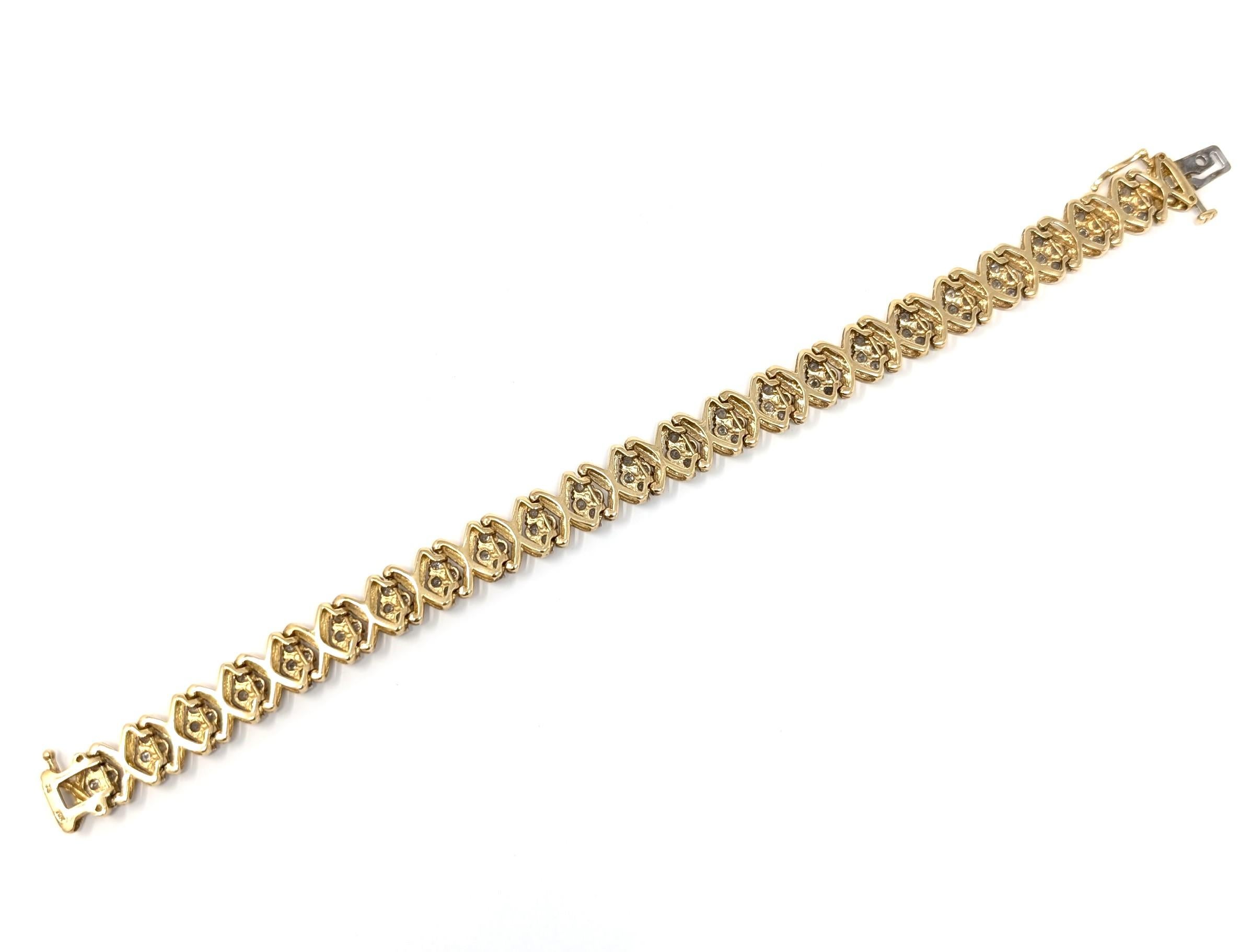 Bracelet grappe vintage en or jaune massif 10 carats signé XOXO Pour femmes en vente