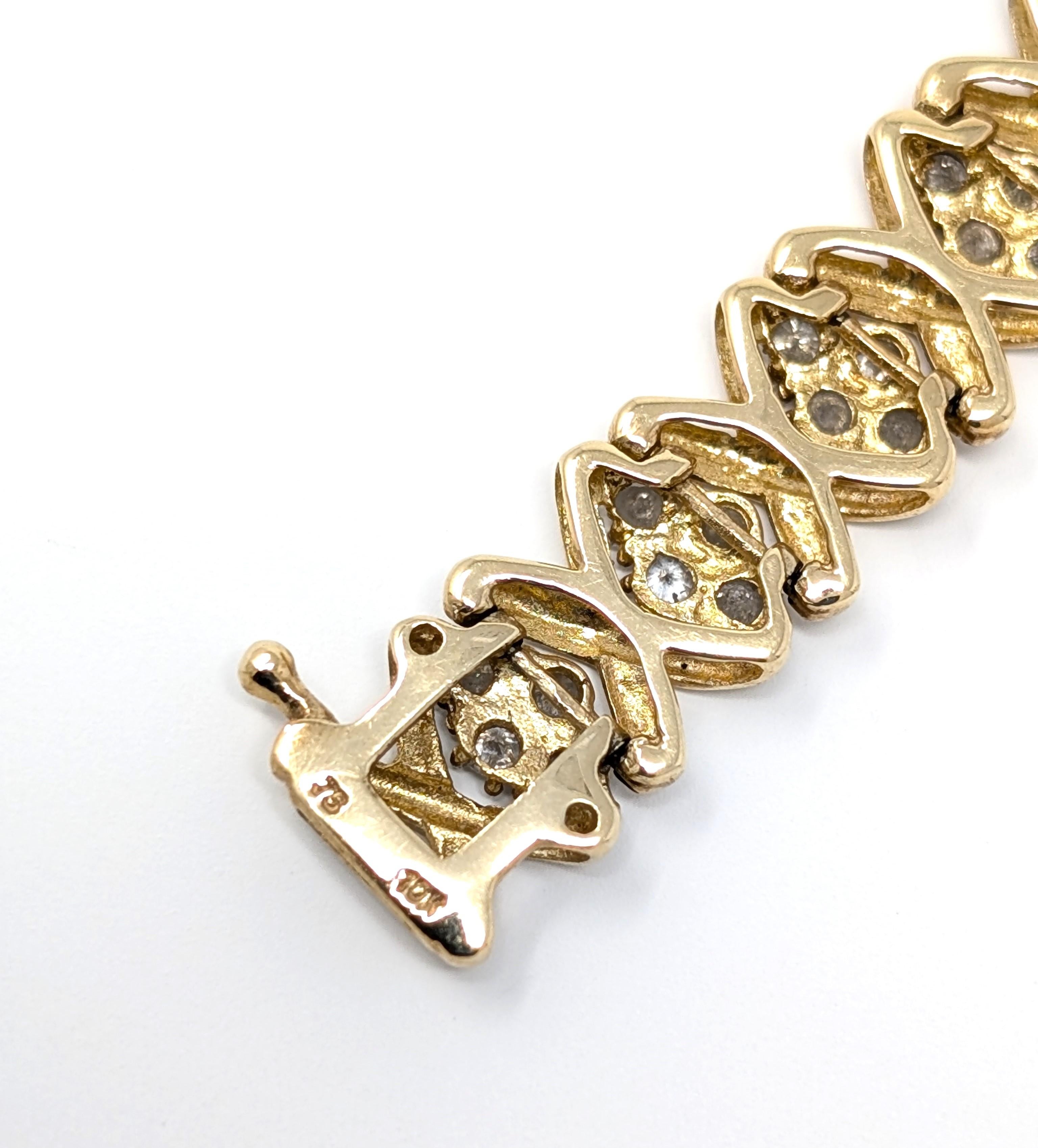 Bracelet grappe vintage en or jaune massif 10 carats signé XOXO en vente 1