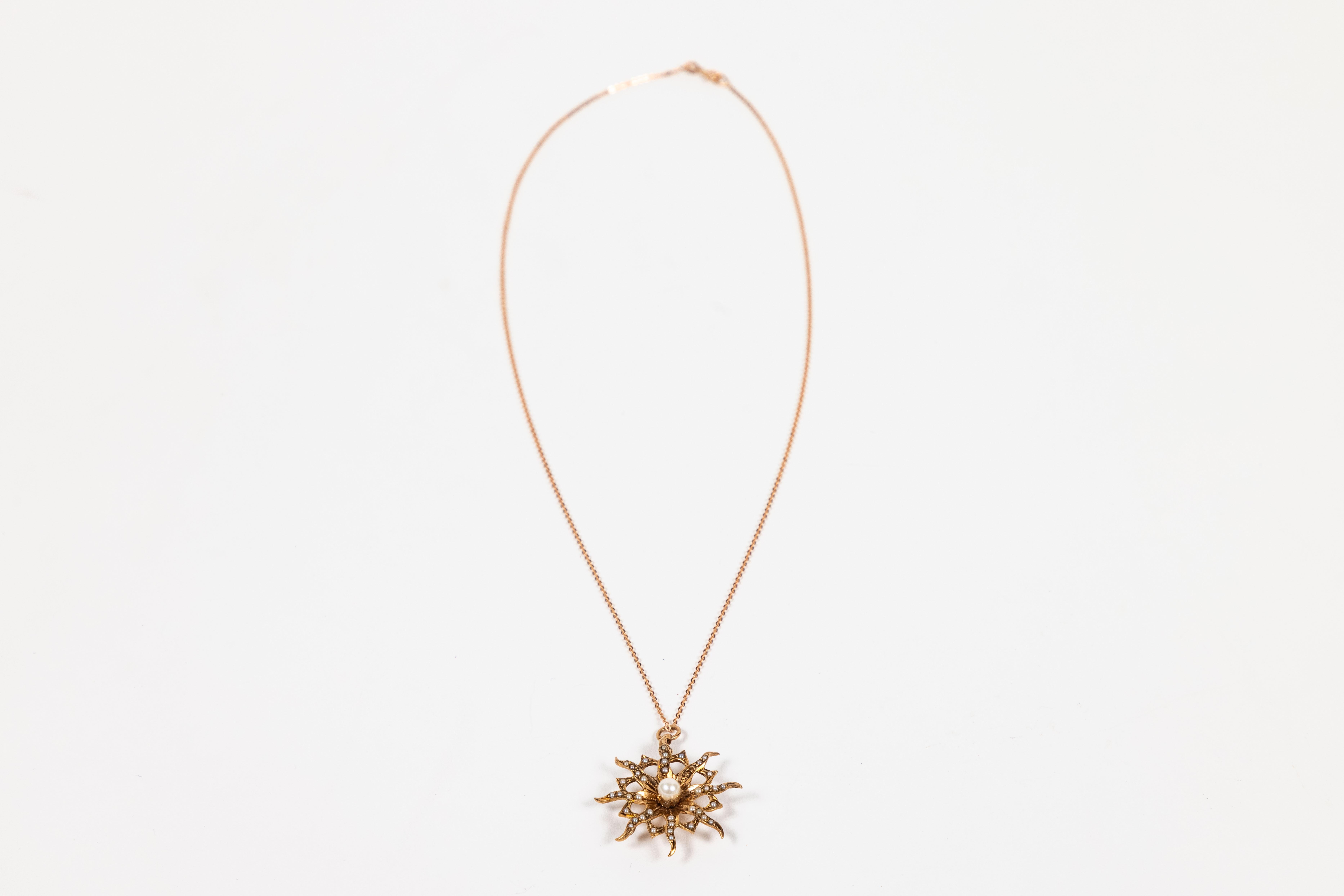 Vintage 10K rose gold Starburst Pendant with Seed Pearls and 1 larger center Pearl and new 14k rose gold chain.