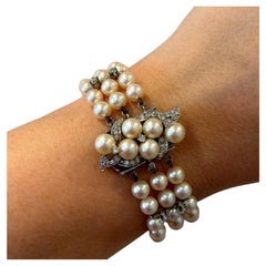 Bracelet Vintage en or blanc 10K 5.50-6mm perles d
Akoya et diamants à trois brins