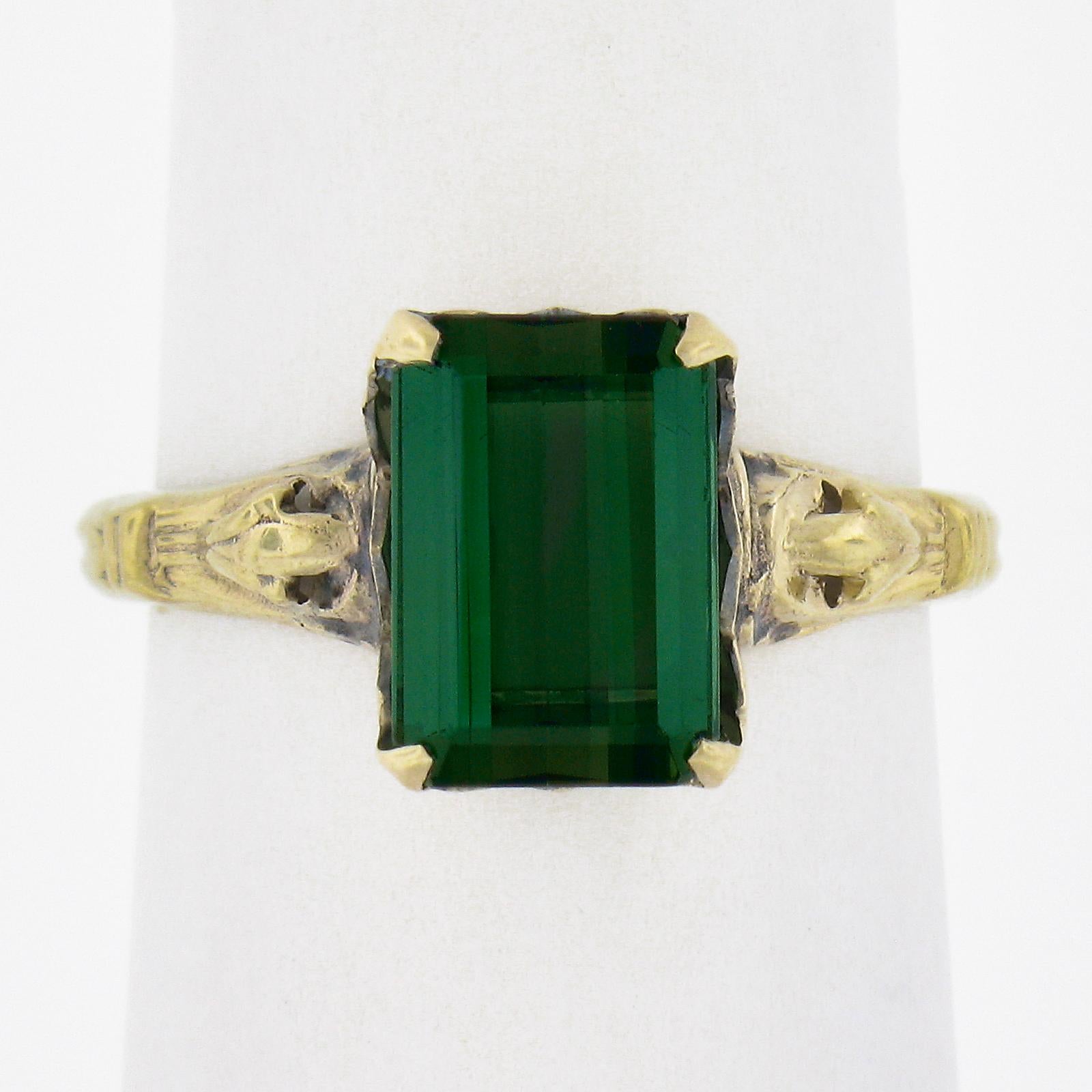 --Stone(s):--
(1) Natural Genuine Tourmaline - Emerald Cut - Claw Prong Set - Lively Clean Green Color - 9.8x6.6mm (approx.) - 2.64ct (exact)

Material: Solid 10K Yellow Gold 
Weight: 2.14 Grams
Ring Size: 6.5 (Fitted on a finger. We can custom size