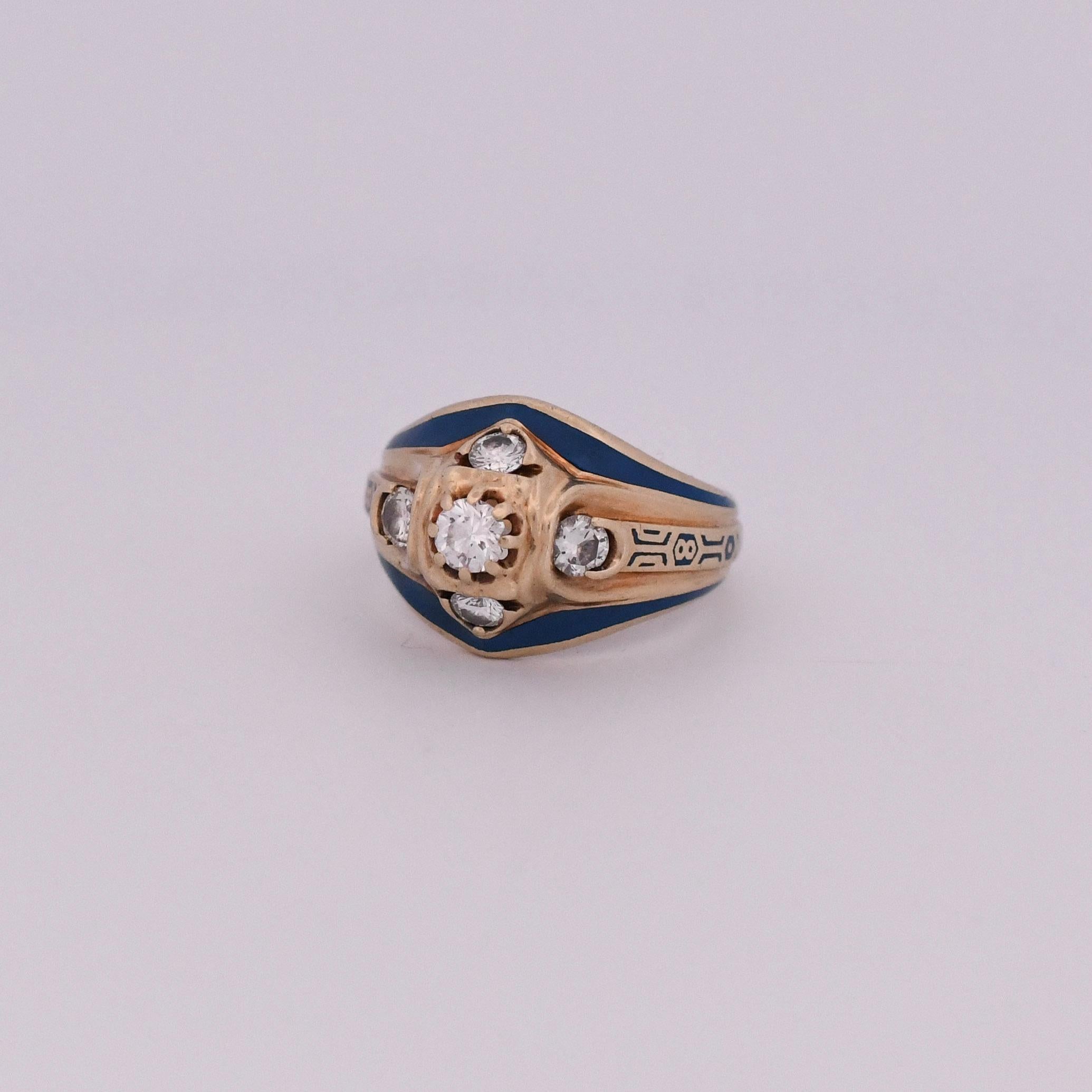 A remarkable and captivating treasure, this bold ring exudes a regal charm with its royal blue enamel details, carefully crafted in 10K yellow gold. The five-diamond design adds a touch of vintage elegance, creating a truly majestic and distinctive