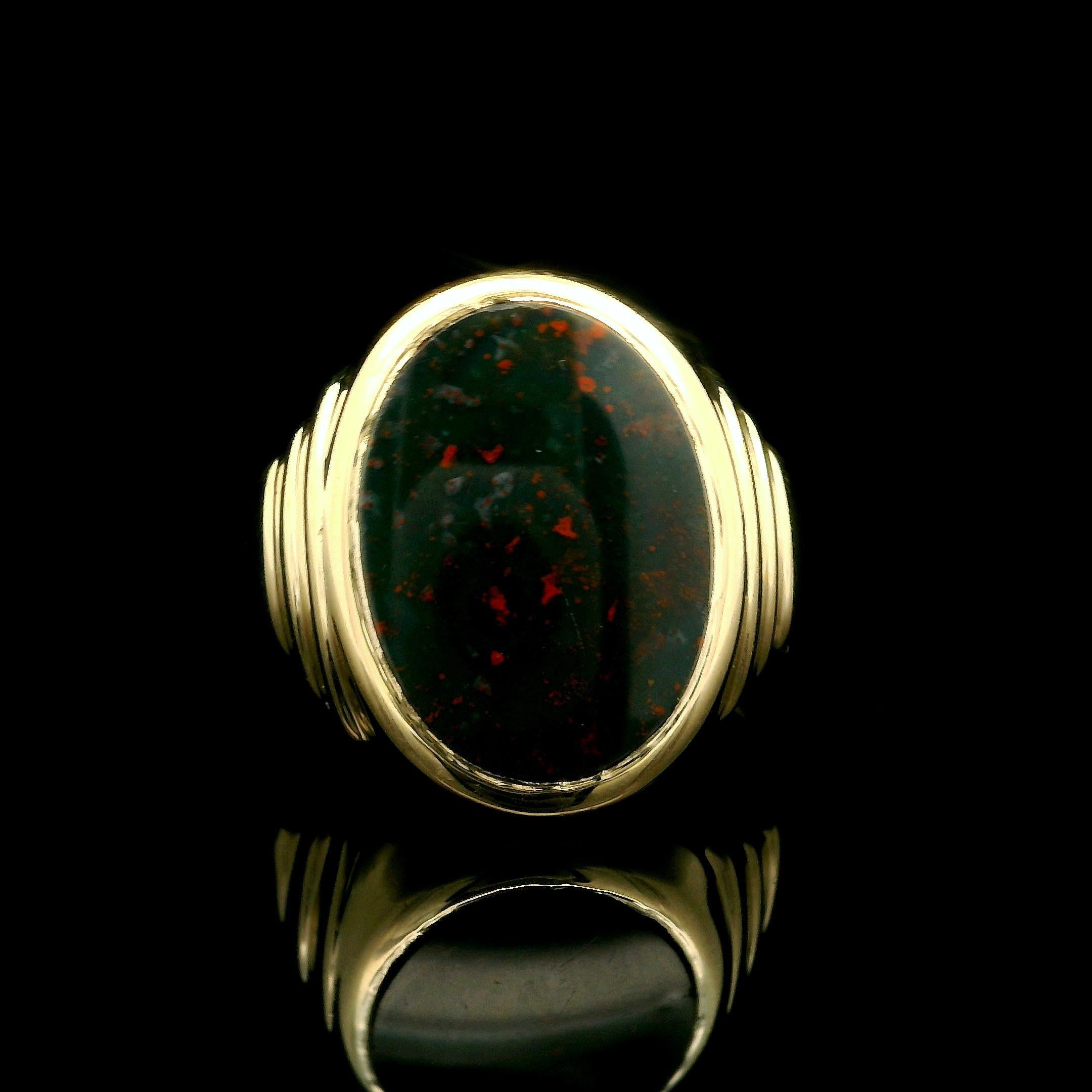 –Stone(s)–
(1) Natural Genuine Bloodstone - Oval Cut - Bezel Set - Deep Green Color w/ Red Specs  - 15.92 x 11.7mnm (approx.)

Material: Solid 10k Yellow Gold
Weight: 4.54 Grams
Ring Size: 7.5 ( fitted on finger, please contact us prior to purchase