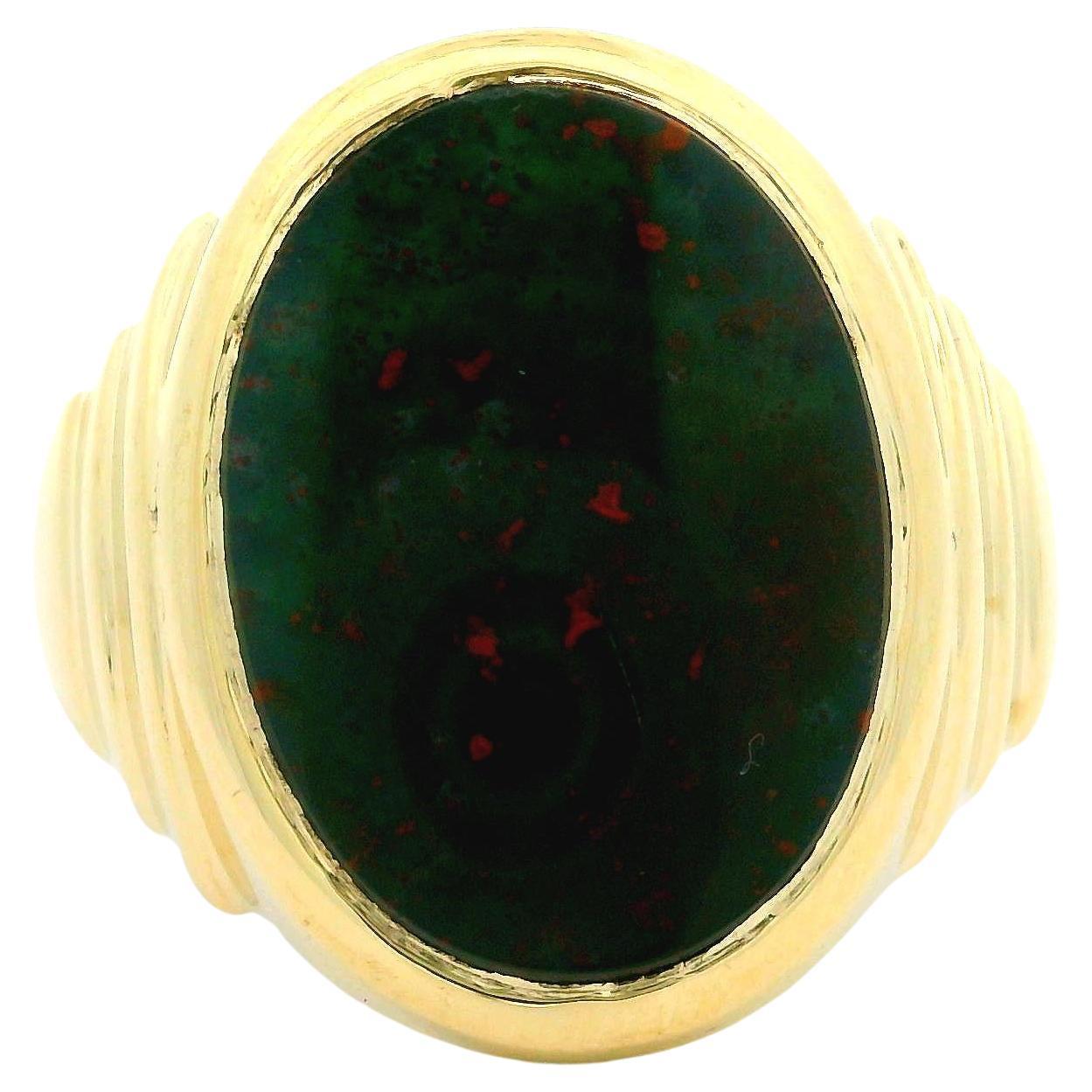 Anillo unisex vintage de oro amarillo de 10k con piedra de sangre ovalada pulida por los lados