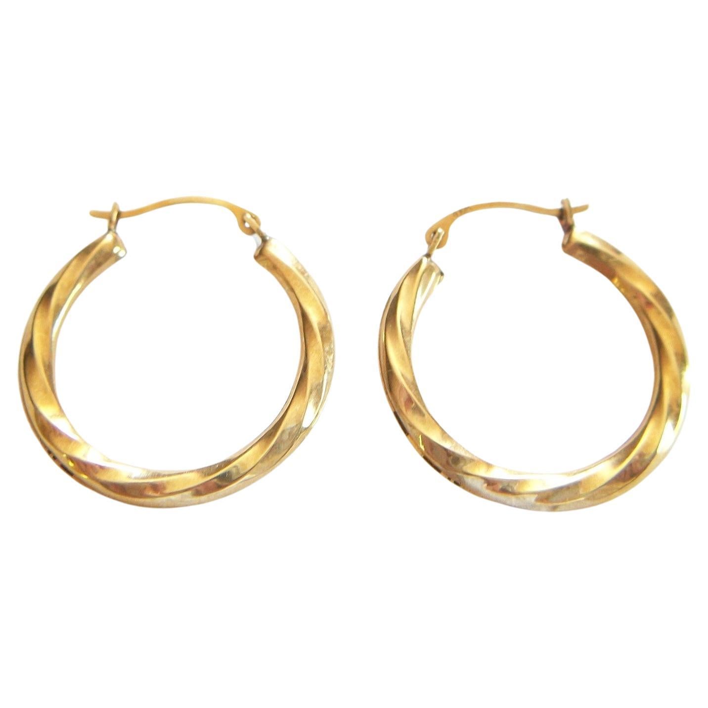 Vintage 10k Yellow Gold Twisted Hoop Earrings, Signed, U.S.A., circa 1980s For Sale