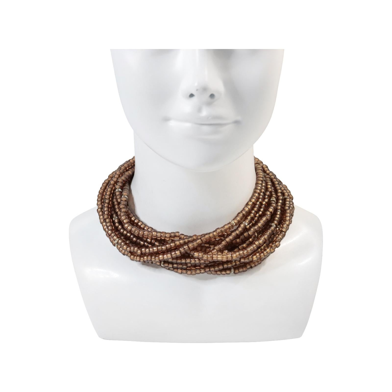 Vintage 11 Strand Smokey Brown Quartz Color With Rondelle Scatters Circa 1990s. This chic piece features small beads with scattered diamante rondelle pieces. The color is reminiscent of smoky brown quartz, which shimmers and changes with the light.