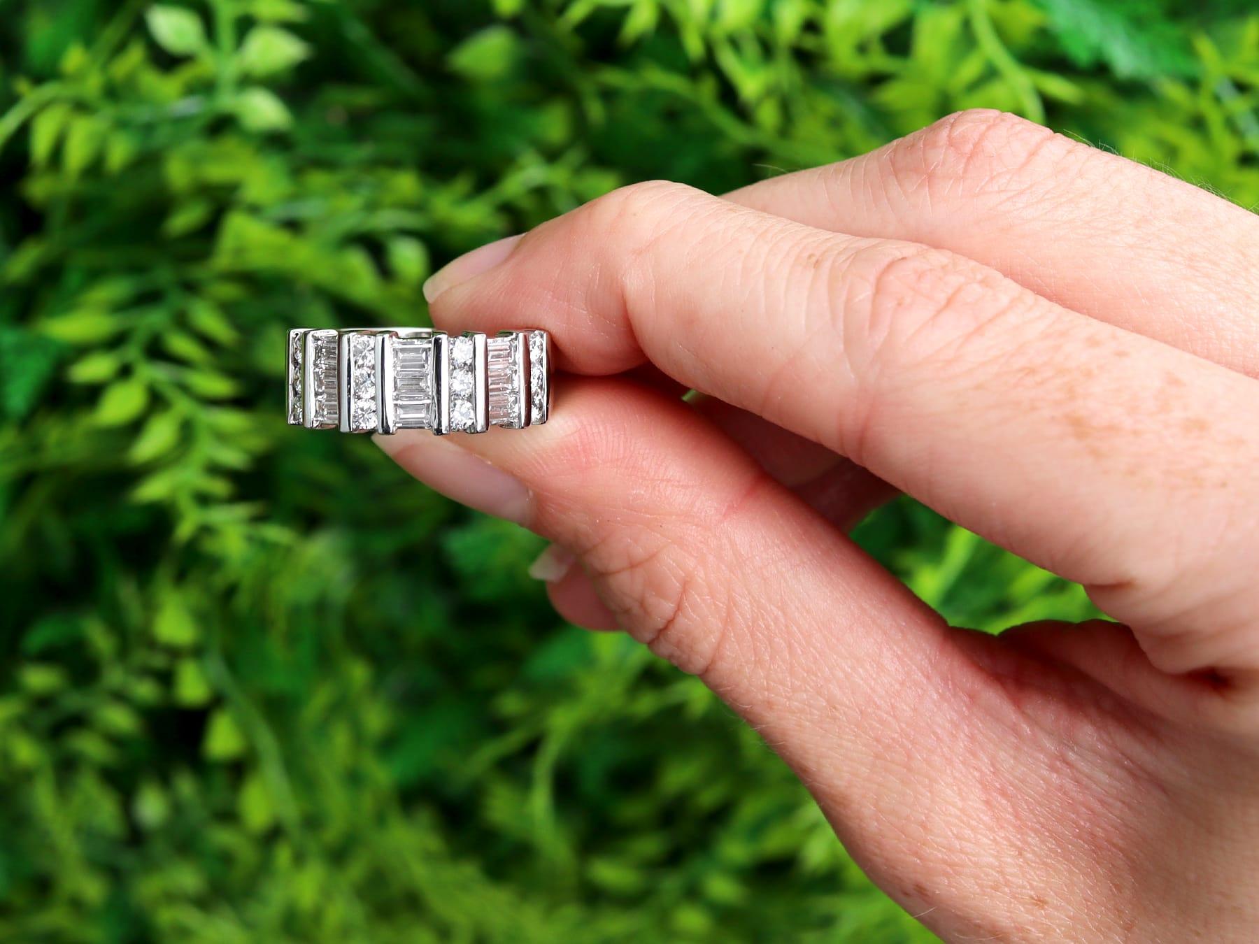 A fine and impressive vintage 1.10 carat diamond, platinum ring; part of our diverse vintage collection of diamond rings

This fine and impressive 1960s ring has been crafted in platinum.

The substantial ring setting displays repeating vertical