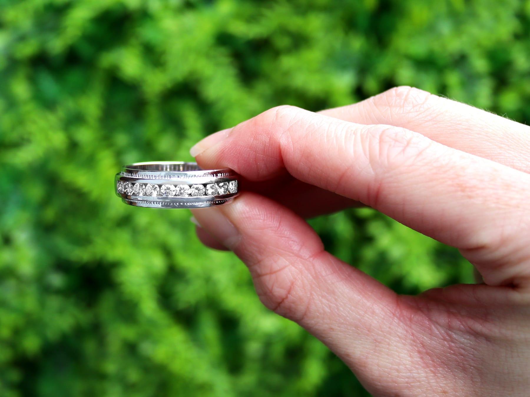 A fine and impressive 1.10 carat diamond, 14 karat white gold half eternity ring; part of our vintage diamond jewelry collection.

This fine vintage half eternity diamond ring has been crafted in 14k white gold.

The anterior surface of the ring is