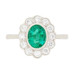 Vintage 1.10 Carat Emerald and Diamond Halo Ring, circa 1960s