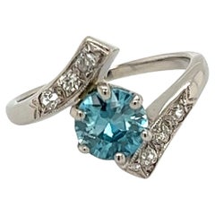 Retro 1.13 Carat Blue Zircon and Diamond Art Deco Bypass Gold Ring 