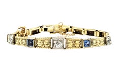 Armband aus 18 Karat Gelbgold mit 1,13 Karat insgesamt Diamanten und Saphiren