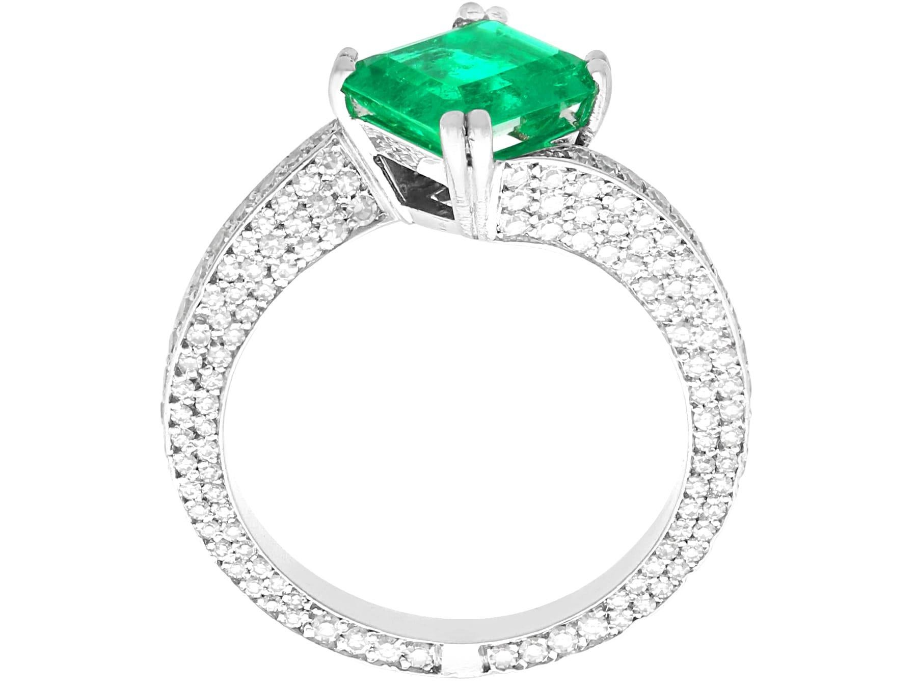 Women's or Men's Vintage 1.13 Carat Emerald 2.20ct Diamond Platinum Twist Dress Ring, circa 1990 For Sale