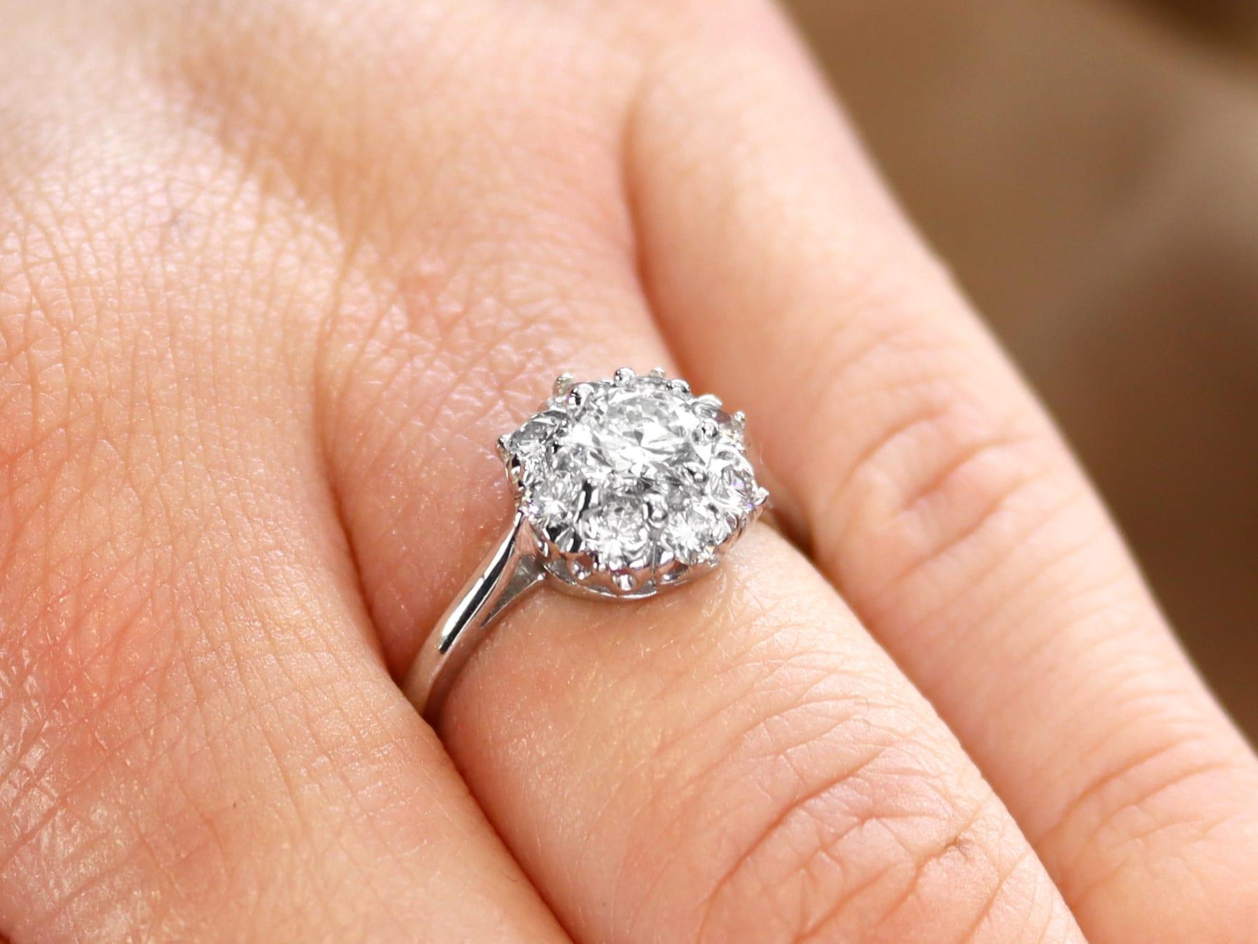 Round Cut Vintage 1.14 Carat Diamond and Platinum Cluster Engagement Ring, Circa 1940 For Sale
