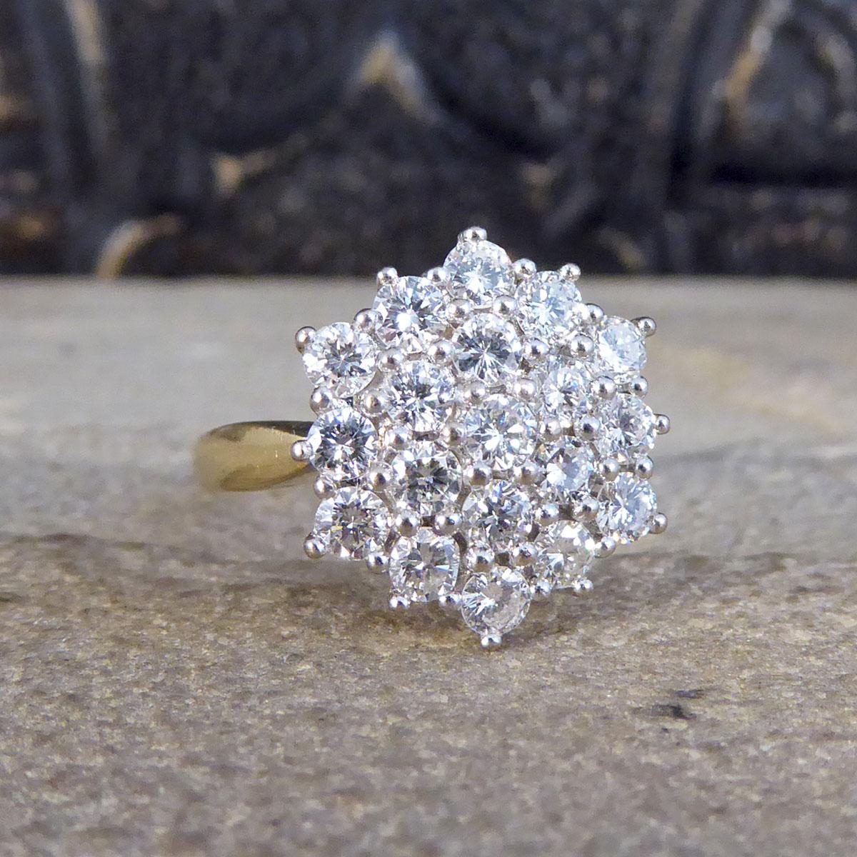 Such a lovely vintage ring modelled in 18ct Yellow Gold with an 18ct White Gold setting holding a Diamond cluster. Holding a total of 1.14ct of Brilliant Cut Diamonds well matched and held securely into place in a claw setting. A great vintage ring