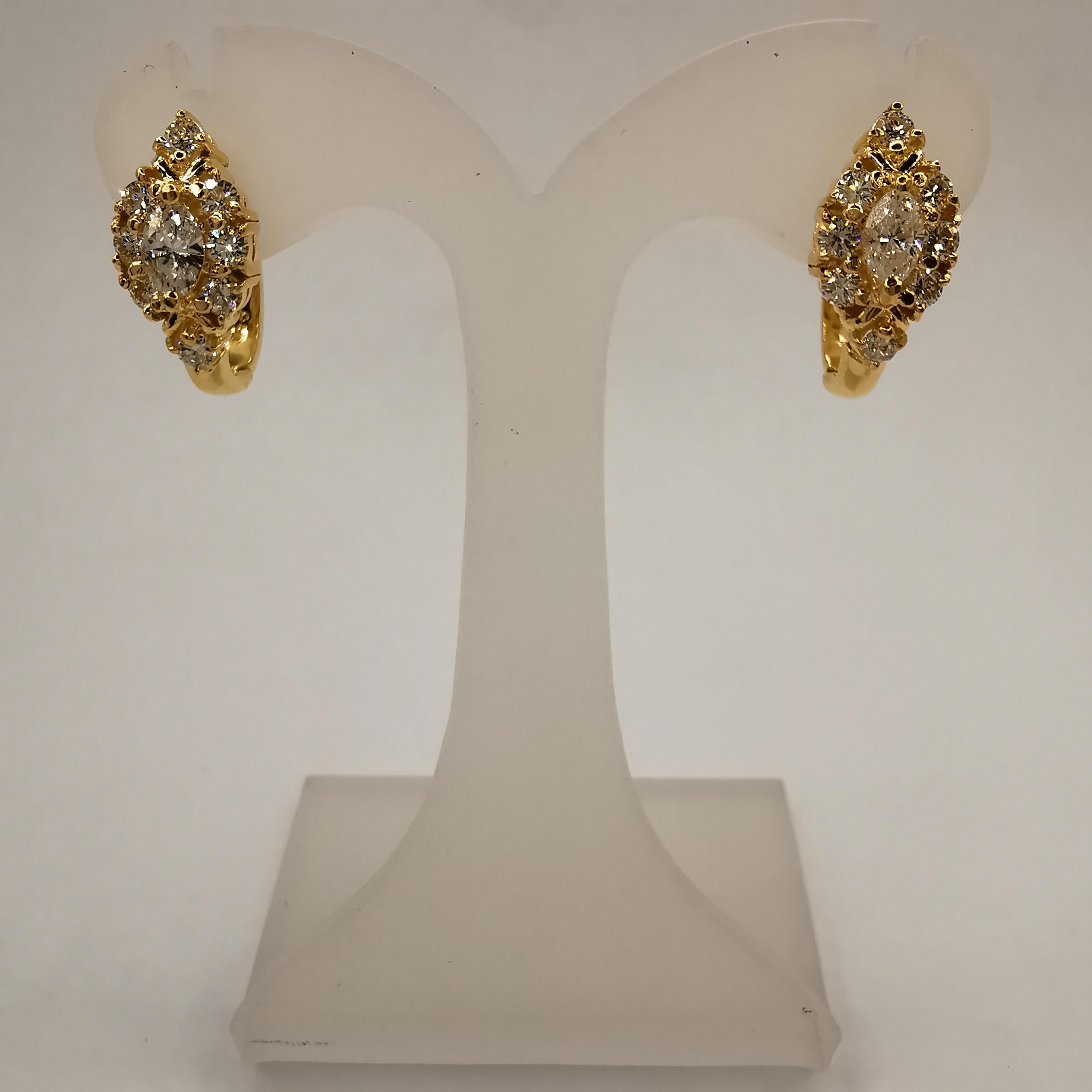 Diese atemberaubenden 115 Karat Marquise Diamantohrringe sind das perfekte Accessoire für jeden besonderen Anlass. Die Ohrringe sind aus 850er Gelbgold gefertigt, das einen Feingehalt von etwas über 20 Karat aufweist. Sie bestehen aus einem Paar