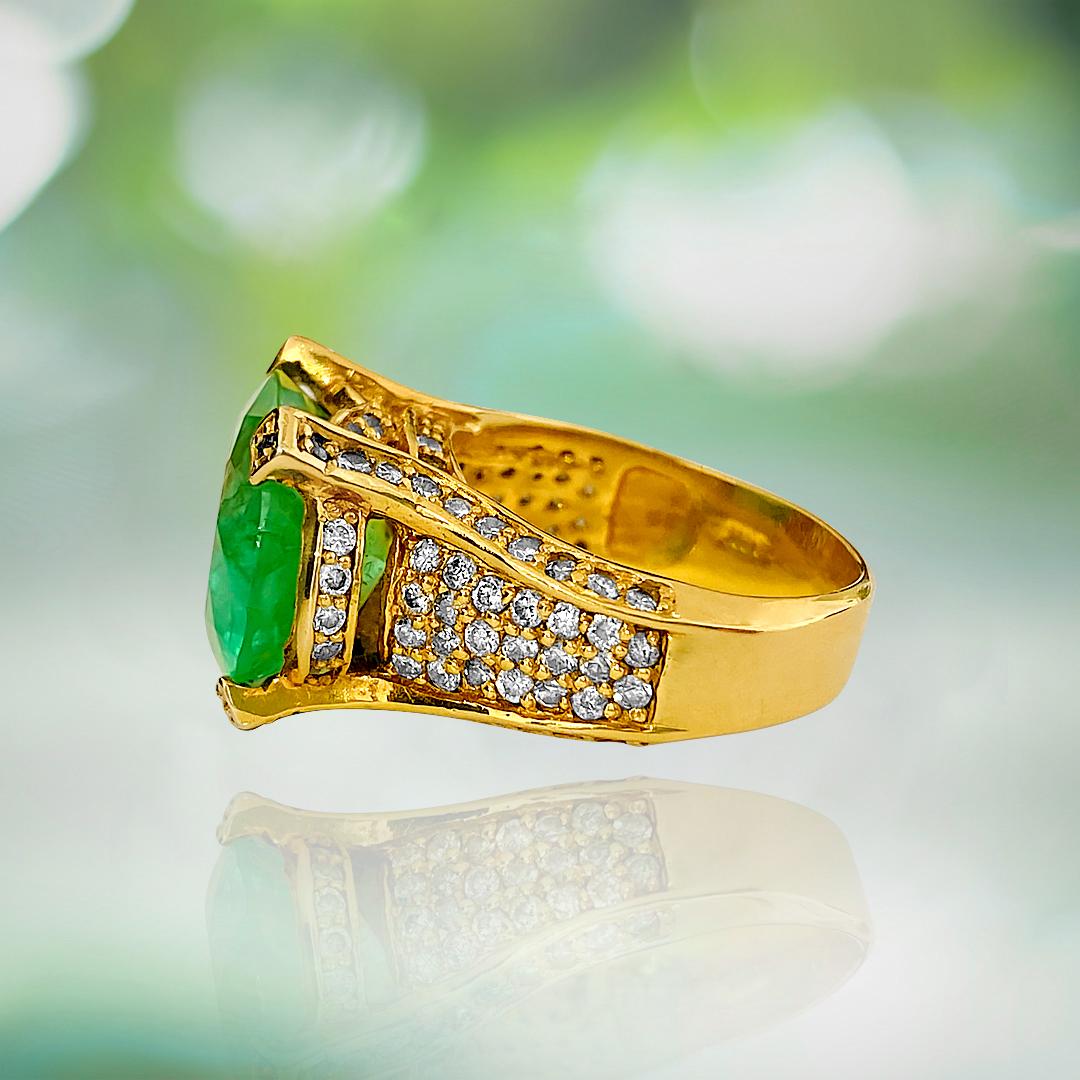 Metal: 14K yellow gold. 

11.50 carat Colombian emerald, oval cut. 100% natural earth mined emerald set in prongs. Deep and intense saturation in the emerald. 

1.50 TCW diamonds. SI clarity and G color. 100% natural earth mined and genuine round