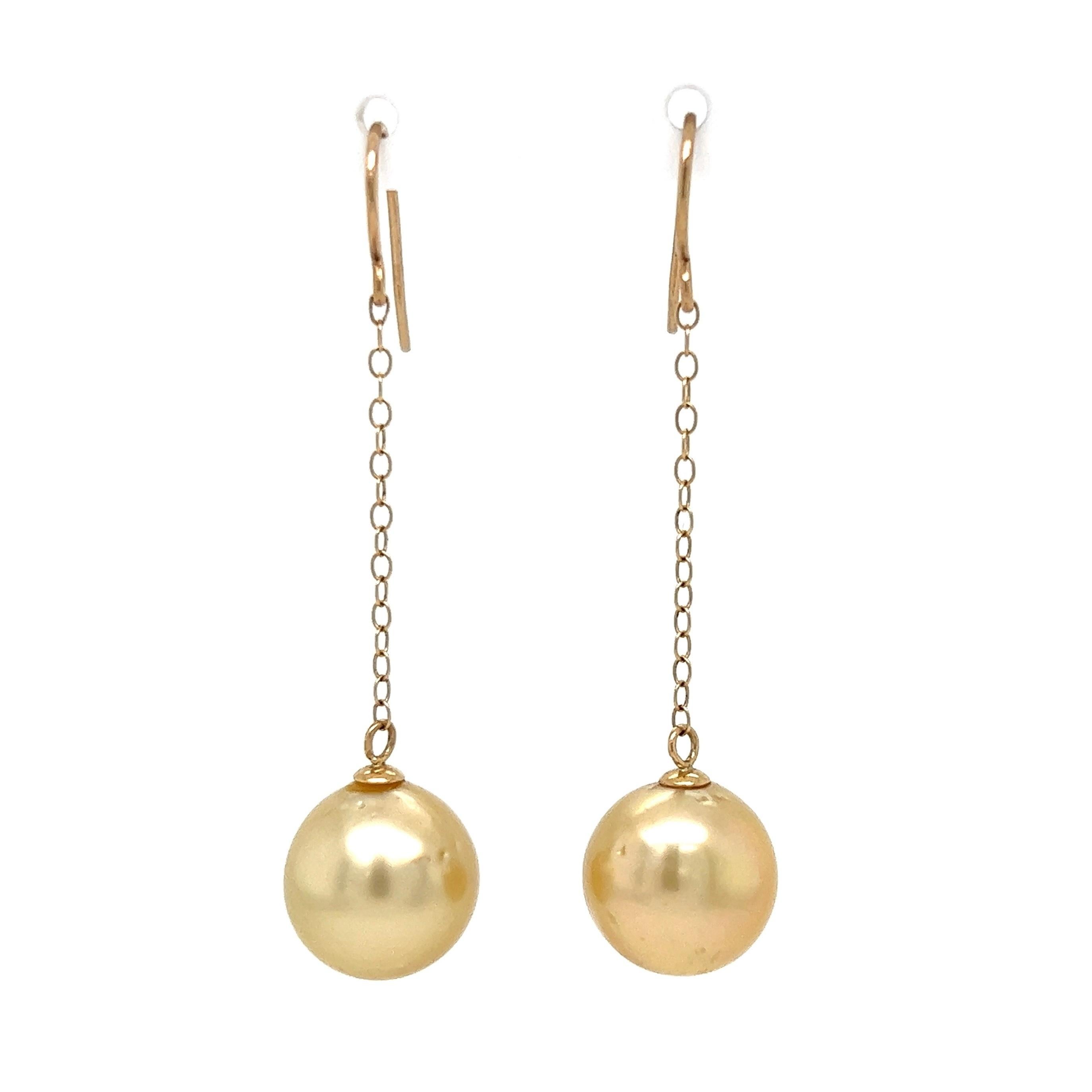 Simply Beautiful! 11.5mm South Sea Pearl Gold Drop Earrings. Suspended from a 14K Yellow Gold Link chain. Measuring approx. 1.8” l. The earrings are in excellent condition and were recently professionally cleaned and polished. These Simple and