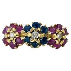Retro 1.17 Carat Rubys, Sapphires, Emeralds and Diamonds Floral Cluster Ring