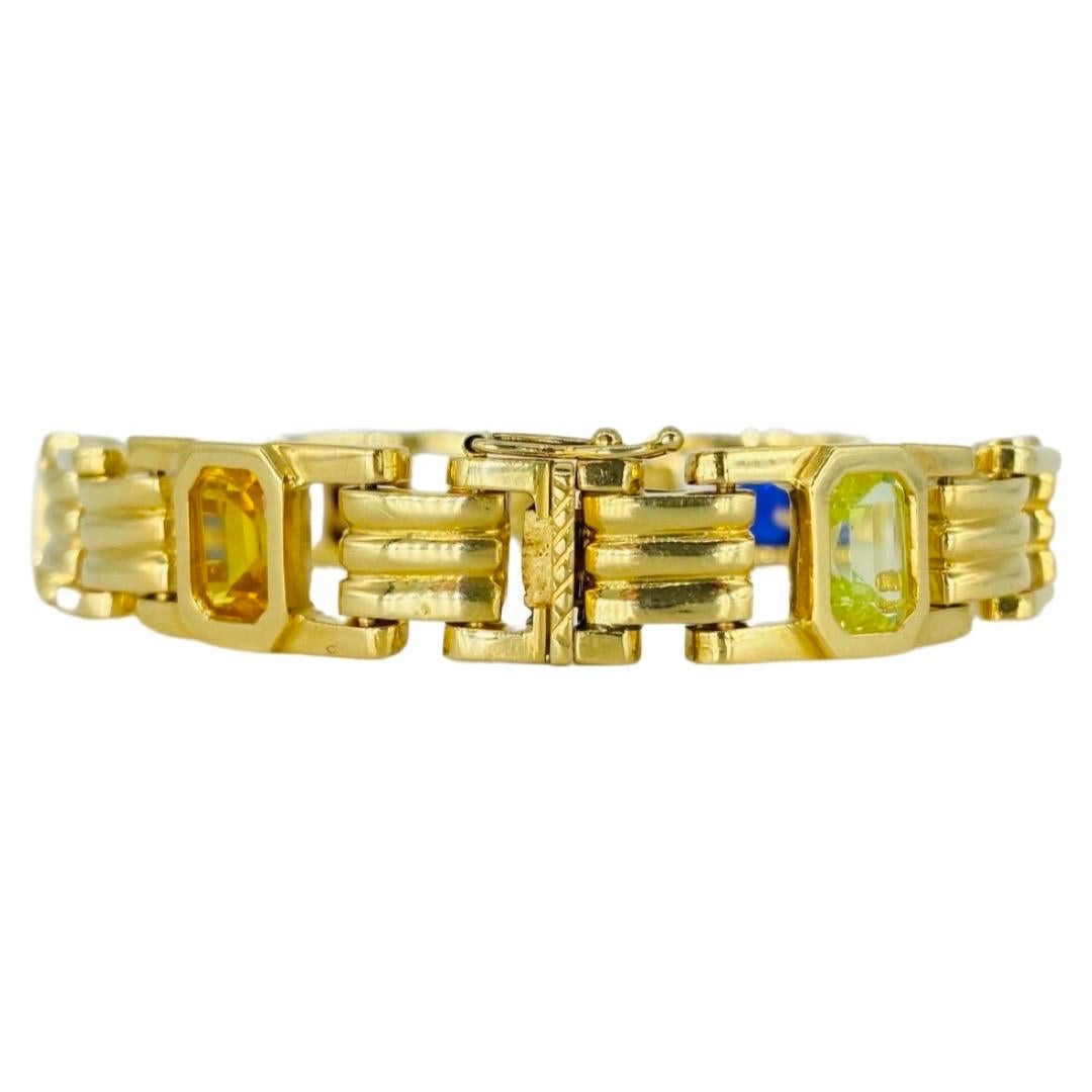 Vintage 11mm Multi-Gemstone Bracelet Italy 18k Gold Made in Italy 7.5 Inch. Very luxurious bracelet featuring different array of colors. The bracelet is very heavy weighting approx 32.9 grams in total weight and is made of 18 karat gold. The