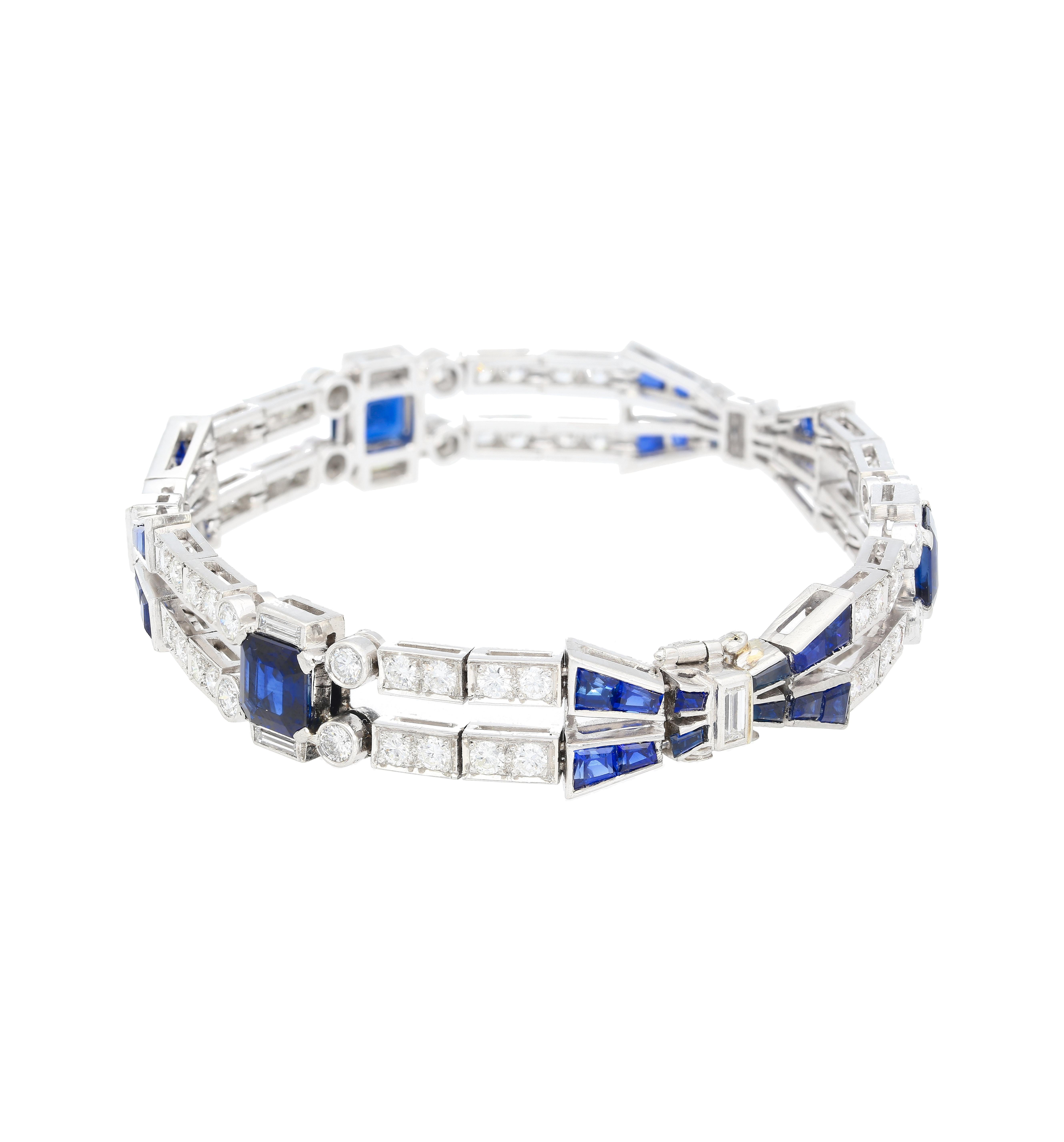 Indulge in the timeless allure of Art Deco with our stunning Blue Sapphire and Diamond Bracelet set in platinum. This exquisite piece embodies the essence of Art Deco design, boasting a perfect blend of quintessential Art Deco symmetry and vibrant