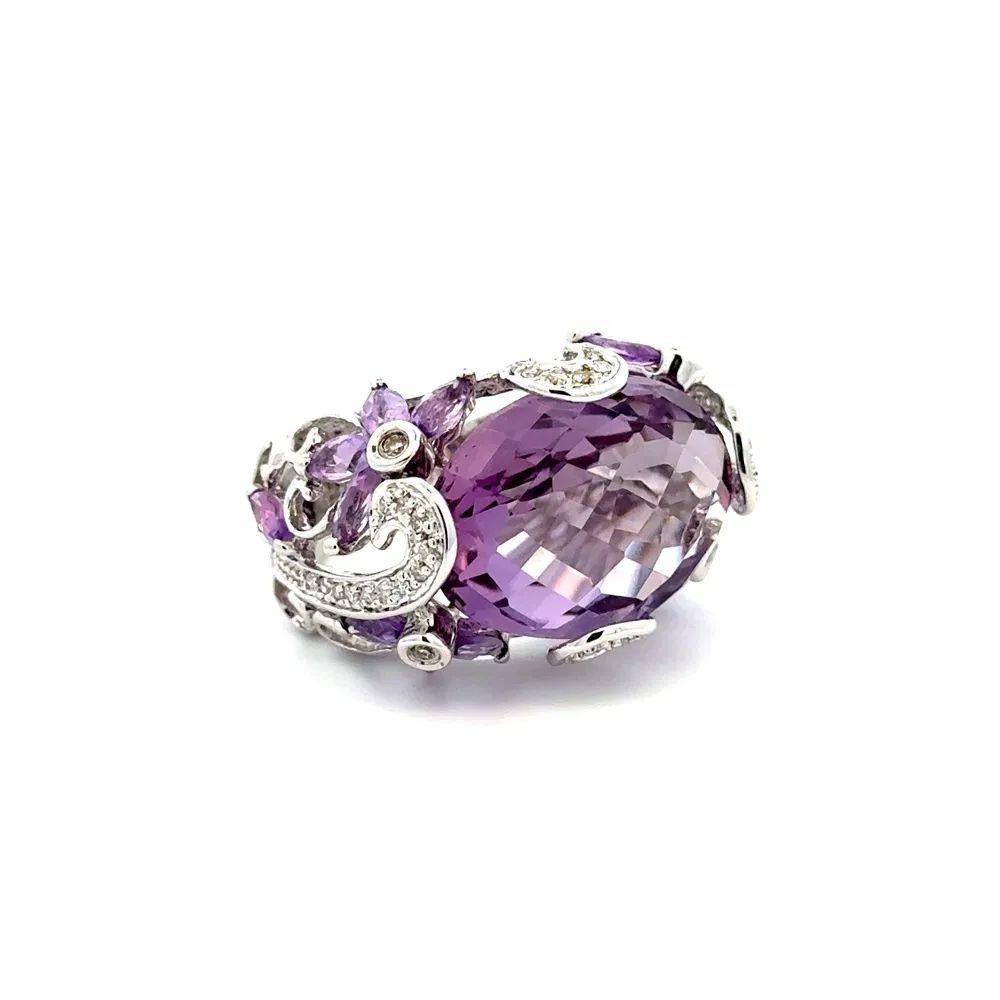 Simply Beautiful! Checkerboard Amethyst and Diamond Gold Ring. Centering a securely nestled Hand set 12 Carat Checkerboard Amethyst. Surrounded by Diamonds, weighing approx. 0.36tcw and Amethyst, approx. 1.00 Carat. Hand crafted 14K White Gold