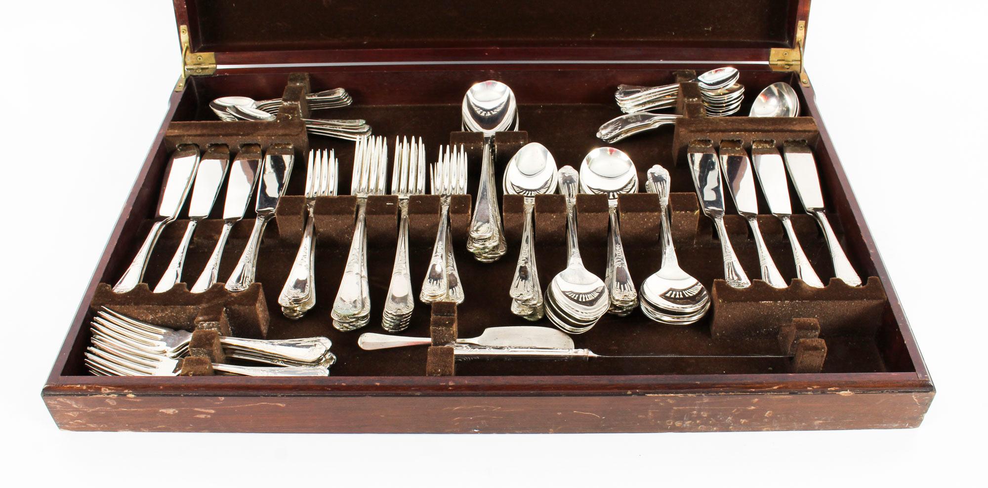 This is a beautiful 131 piece 12 place settings silver plated cased canteen made in Sheffield England, mid-20th century in date.

The exceptional quality cutlery includes its original mahogany canteen case with brown velvet interior .

The set