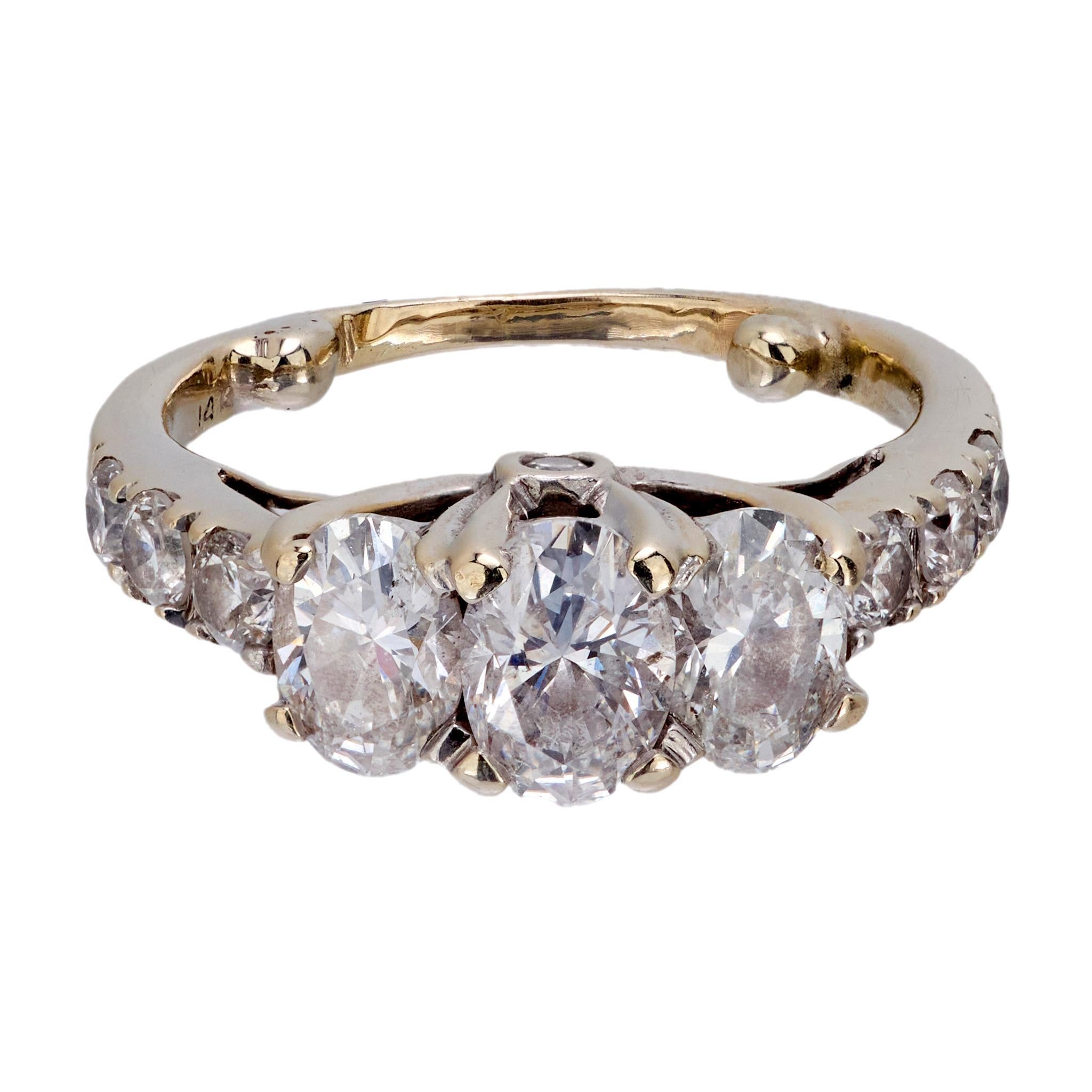 Modern Vintage 1.20 carat oval diamond 3 stone 14k white gold ring For Sale