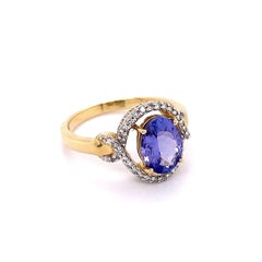 By Vintage 1.20 Carat Oval Tanzanite and Diamond Ring