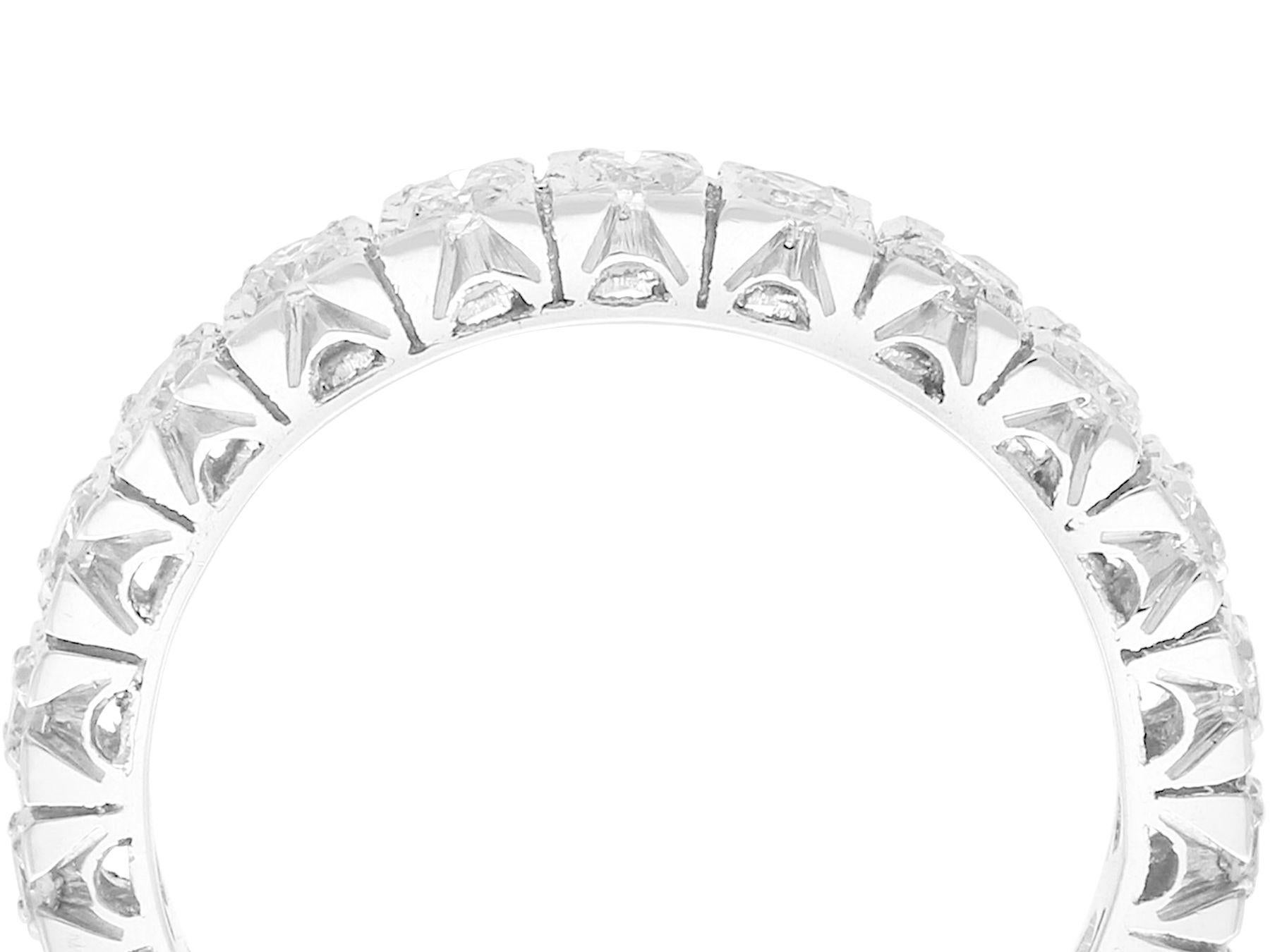 A fine and impressive vintage 1.20 carat diamond platinum and palladium full eternity ring; part of our diverse diamond jewelry and estate jewelry collections.

This fine and impressive vintage diamond eternity ring has been crafted in platinum and