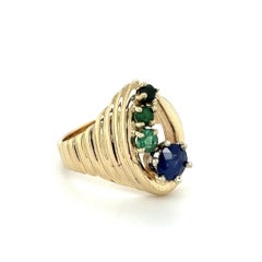 Vintage 1.22 Carat Round Sapphire and Tapered Emerald Gold Wave Ring