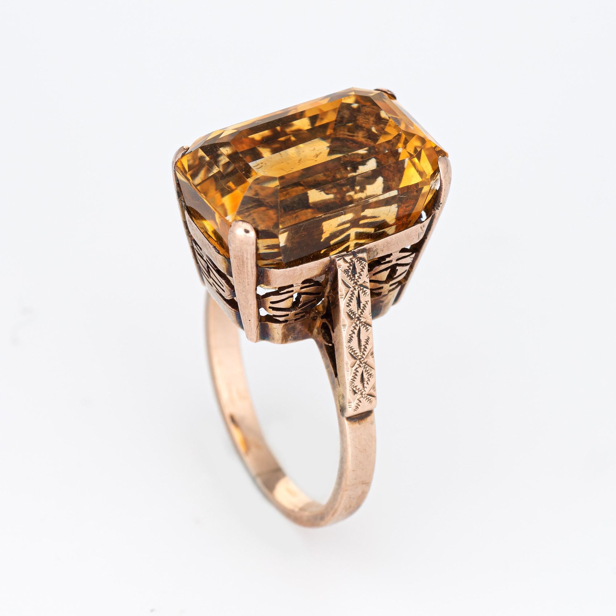 Stylish vintage golden citrine cocktail ring (circa 1950s to 1960s) crafted in 9 karat rose gold. 

Step cut rectangular citrine measures 16mm x 10.5mm x 12.5mm (estimated at 12.25 carats). The citrine is in very good condition and free of cracks or