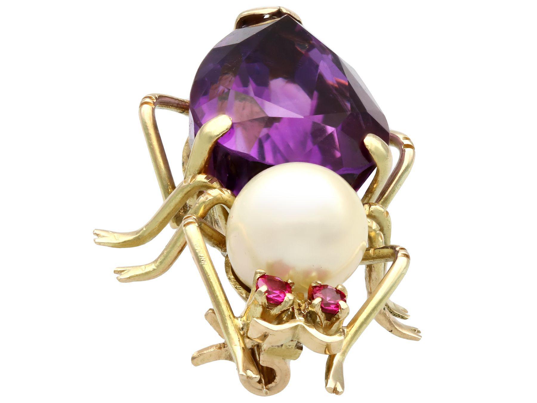 A fine and impressive 12.39 carat amethyst, pearl and 0.06 carat ruby, 14 karat yellow gold 'insect' brooch; part of our diverse vintage jewelry and estate jewelry collections

This fine and impressive vintage amethyst brooch has been crafted in 14k