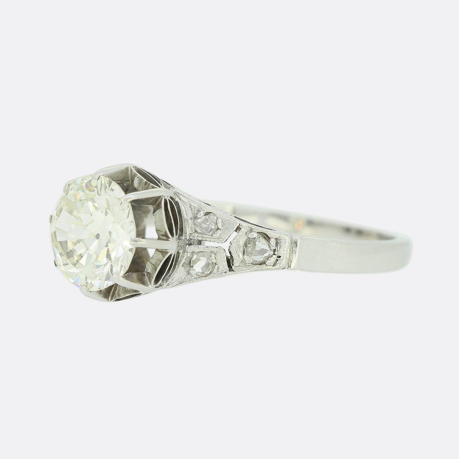 This is a beautiful, 18ct white gold diamond engagement ring. The focal point of this ring is a stunning 1.24 carat old European cut diamond. Each shoulder plays host to 3 rose cut diamonds.

Condition: Used (Excellent)
Weight: 2.4 grams
Size: L