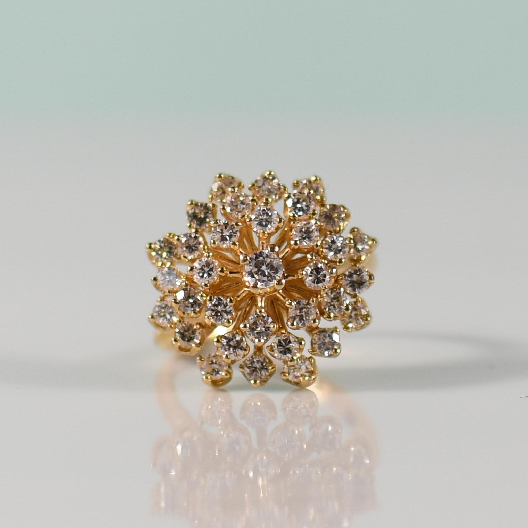 Embrace timeless elegance with this vintage-inspired diamond cluster/burst ring, a true testament to enduring beauty. Crafted in radiant 14k yellow gold, the ring features a captivating array of diamonds arranged in a burst-like pattern, exuding an