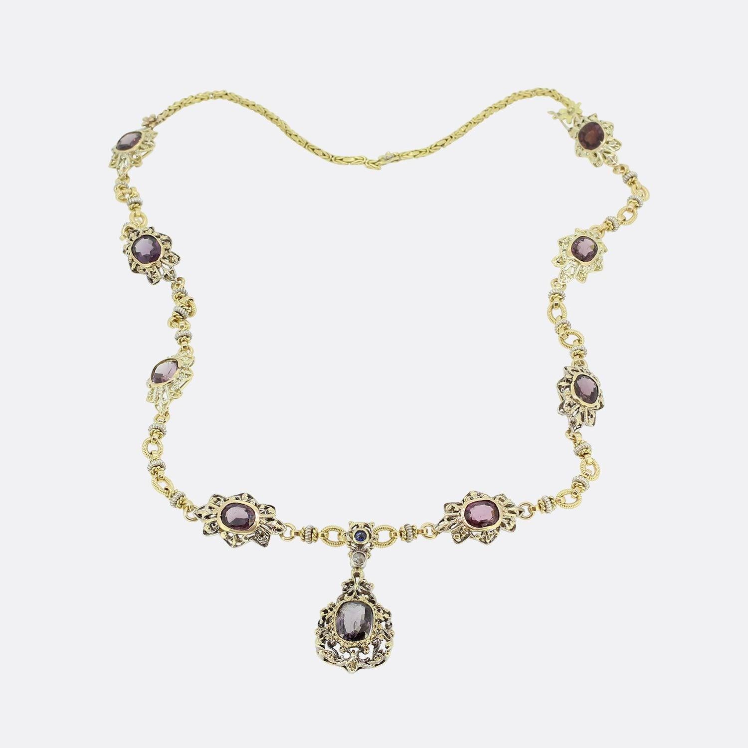 This is a vintage 18ct yellow gold spinel necklace featuring eight cushion cut natural Burmese spinels which have been rubover set in 18ct yellow gold. The chain and setting has been hand crafted in a very unique and interesting style. Additionally,