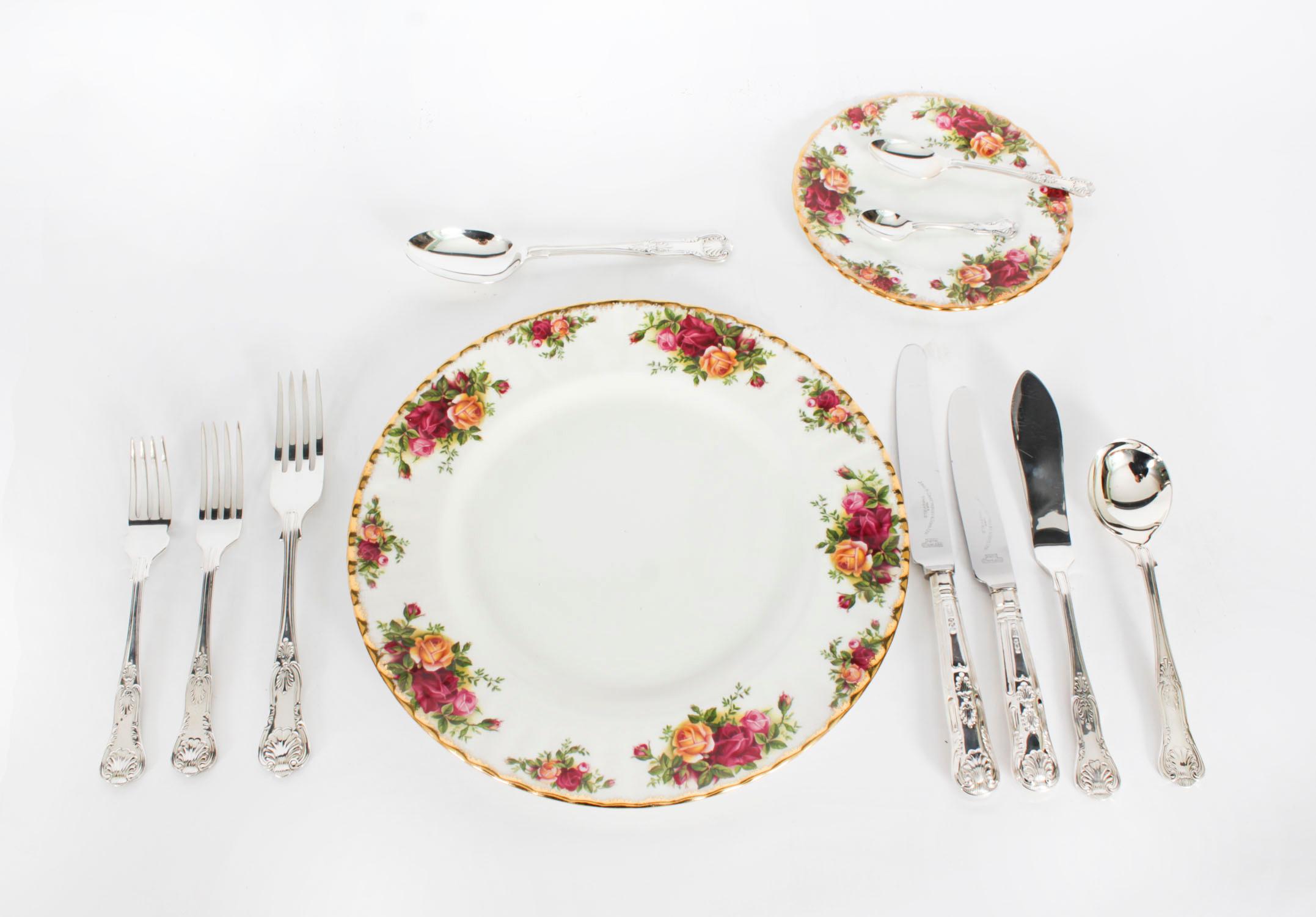 A rare and complete Elizabeth II, 127 piece 12 place setting Kings Pattern sterling silver table-service, bearing hallmarks for 1978 and the makers mark of  John B. Chatterley and Sons, of Sheffield, England.

The complete set for 12 is displayed in