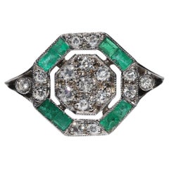 Bague vintage décorée de diamants naturels et d'émeraudes calibrées en or 12 carats