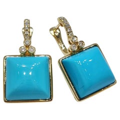 Boucles d
oreilles vintage en or jaune 14 carats avec turquoise de 12 mm et diamant
