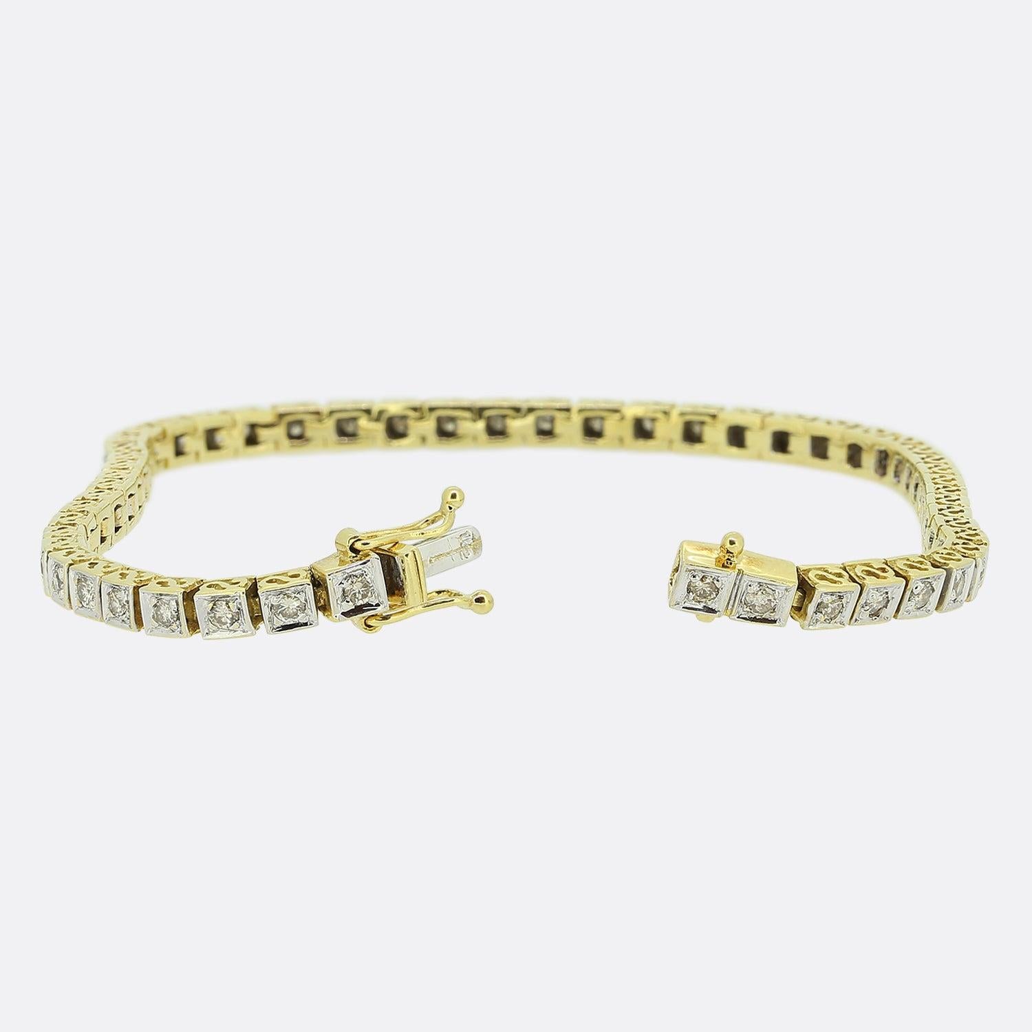 Here we have a marvellous diamond line bracelet. This vintage piece has been crafted from 18ct yellow gold and is comprised of 52 boxed links; each of which has been individually tipped in white gold and plays host to a single claw set round