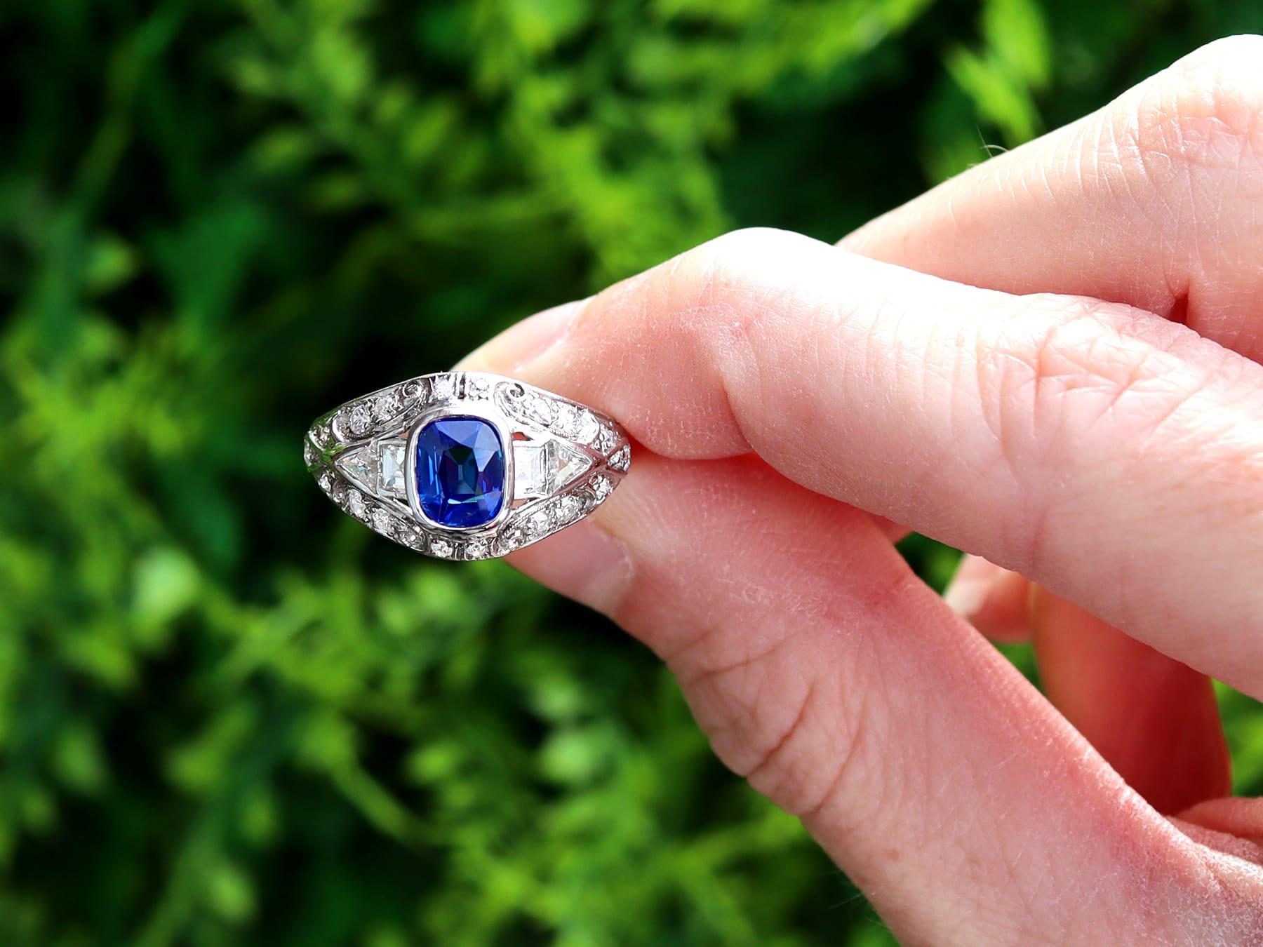 A fine and impressive vintage 1.32 carat sapphire and 0.52 carat diamond, platinum cocktail ring; part of our diverse vintage sapphire jewellery collections

This stunning, fine and impressive sapphire and diamond ring has been crafted in