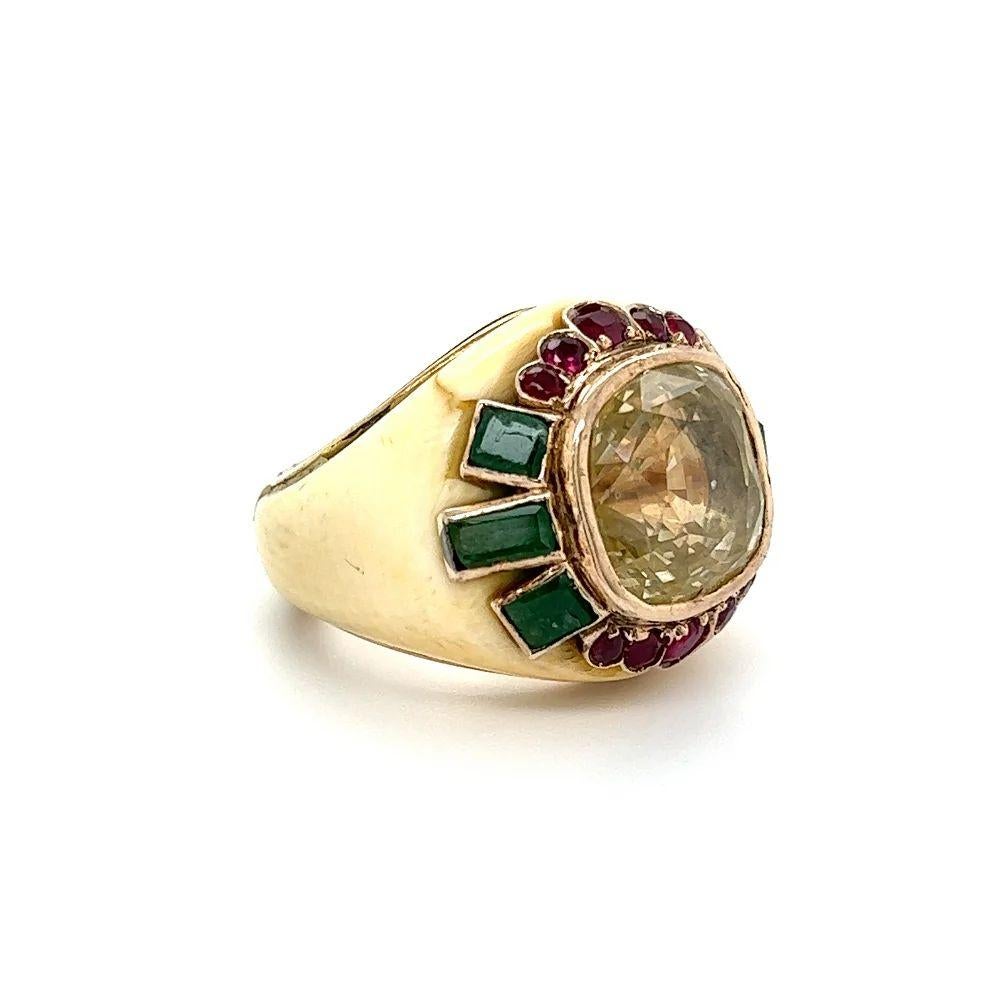 Simply Beautiful! Finely detailed Natural NO HEAT Yellow Sapphire GIA, Emerald, Ruby and Bone Gold Cocktail Ring. Centering a securely nestled Hand set Yellow Sapphire weighing approx. 13.25 Carat and measuring 13.15 x 13 x 9.16. GIA lab report #